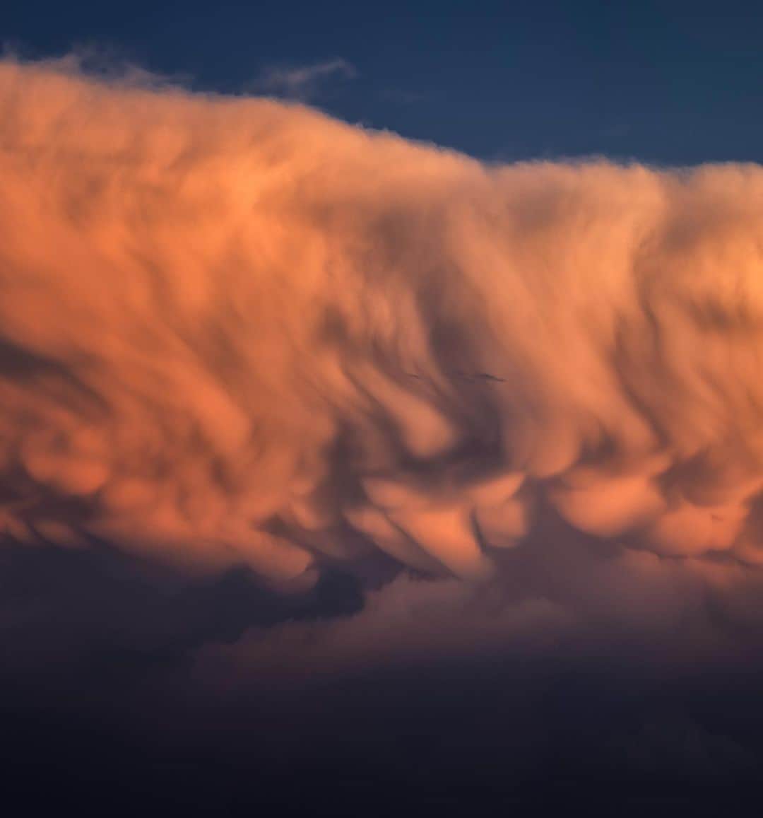Keith Ladzinskiのインスタグラム：「It’s safe to say that we’ve all looked up into the clouds at some point in our lives and said “that looks like an elephant, that one looks like an alligator…” etc. The term for this is #pareidolia, which in essence is to see familiar pattern or recognizable object in something. Our brains rely on everyday pattern recognition to acquire information, hard wired to the gathering of social information. I could go one, but you probably get the point. Clouds, to this day, are a constant source of this for me, and something I’ve always enjoyed, like the face seen here in this colorful stormy sunset.」