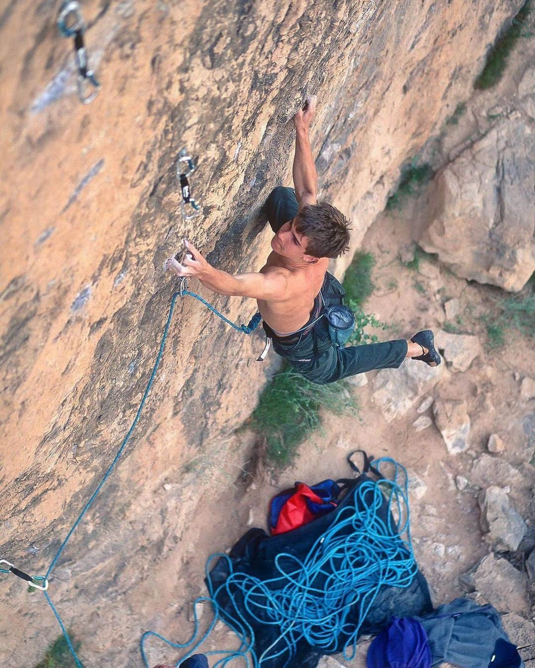 クリス・シャーマさんのインスタグラム写真 - (クリス・シャーマInstagram)「Repost from @jimthornburg • I found and scanned some old shots of @chris_sharma today. As I was looking through them, I was reminded just how different Chris’ climbing style was from other top climbers from that era. It’s true that his feet slipped and cut a lot when he was starting out. It’s also true that his technique was more dynamic than anyone else’s at the time and that he progressed through the grades faster than anyone ever had—in just two years he went from 5.11 to 5.14c. That would be impressive in any era, but 30 years ago nothing like that had happened and it scrambled a lot of brains. 1+2. 1st ascent of Necessary Evil (5.14c) at age 15. 3. 1st ascent of Yo Mamma (13a) at The Pinnacles, 1995. 4. On an early ascent of Lardbutt (13c), 1994 (age 13). 5. 1st ascent of Ubermensch (14a) Pinnacles, 1996. 6. Mickeys Beach Arete (13c) 1995. 7. Surf Safari (13d) 1995. 8. Getting a big head, 1994. 9. Supertweak (14c) 2nd ascent, 1996. 10. Trying Biographie extension (5.15a) in 1997 (he made the FA 4 years later). #climbinghistory #climbingphotography #goat #rockclimbing #chrissharma」8月31日 5時59分 - chris_sharma