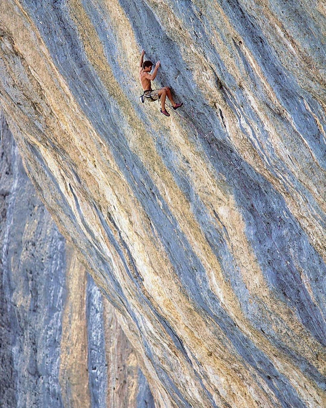 クリス・シャーマさんのインスタグラム写真 - (クリス・シャーマInstagram)「Repost from @jimthornburg • I found and scanned some old shots of @chris_sharma today. As I was looking through them, I was reminded just how different Chris’ climbing style was from other top climbers from that era. It’s true that his feet slipped and cut a lot when he was starting out. It’s also true that his technique was more dynamic than anyone else’s at the time and that he progressed through the grades faster than anyone ever had—in just two years he went from 5.11 to 5.14c. That would be impressive in any era, but 30 years ago nothing like that had happened and it scrambled a lot of brains. 1+2. 1st ascent of Necessary Evil (5.14c) at age 15. 3. 1st ascent of Yo Mamma (13a) at The Pinnacles, 1995. 4. On an early ascent of Lardbutt (13c), 1994 (age 13). 5. 1st ascent of Ubermensch (14a) Pinnacles, 1996. 6. Mickeys Beach Arete (13c) 1995. 7. Surf Safari (13d) 1995. 8. Getting a big head, 1994. 9. Supertweak (14c) 2nd ascent, 1996. 10. Trying Biographie extension (5.15a) in 1997 (he made the FA 4 years later). #climbinghistory #climbingphotography #goat #rockclimbing #chrissharma」8月31日 5時59分 - chris_sharma