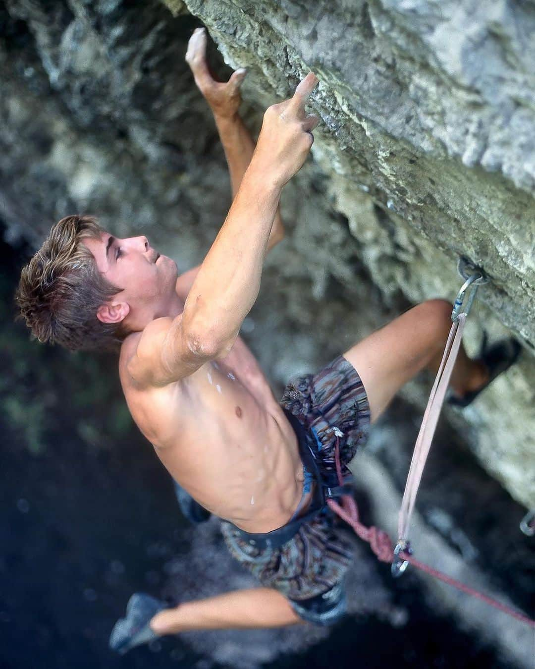 クリス・シャーマさんのインスタグラム写真 - (クリス・シャーマInstagram)「Repost from @jimthornburg • I found and scanned some old shots of @chris_sharma today. As I was looking through them, I was reminded just how different Chris’ climbing style was from other top climbers from that era. It’s true that his feet slipped and cut a lot when he was starting out. It’s also true that his technique was more dynamic than anyone else’s at the time and that he progressed through the grades faster than anyone ever had—in just two years he went from 5.11 to 5.14c. That would be impressive in any era, but 30 years ago nothing like that had happened and it scrambled a lot of brains. 1+2. 1st ascent of Necessary Evil (5.14c) at age 15. 3. 1st ascent of Yo Mamma (13a) at The Pinnacles, 1995. 4. On an early ascent of Lardbutt (13c), 1994 (age 13). 5. 1st ascent of Ubermensch (14a) Pinnacles, 1996. 6. Mickeys Beach Arete (13c) 1995. 7. Surf Safari (13d) 1995. 8. Getting a big head, 1994. 9. Supertweak (14c) 2nd ascent, 1996. 10. Trying Biographie extension (5.15a) in 1997 (he made the FA 4 years later). #climbinghistory #climbingphotography #goat #rockclimbing #chrissharma」8月31日 5時59分 - chris_sharma