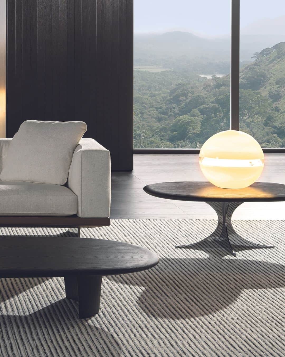 Minotti Londonさんのインスタグラム写真 - (Minotti LondonInstagram)「Anish Wood is the new version of the coffee table designed by @rodolfodordoni, now featuring new materials, shapes and dimensions.  The circular or elliptical Licorice coloured ash top has edges smoothed like a river pebble, the result of in-depth technological research, and rests on the characteristic polished chrome or Pewter metal base.  Tap the link in our bio to explore the Anish Wood coffee table.  #minotti #minottilondon #minottifurniture #minottiitalia #minotti2023collection #table #madeinitaly」8月31日 16時33分 - minottilondon