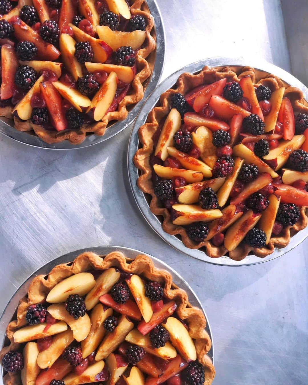 DOMINIQUE ANSEL BAKERYさんのインスタグラム写真 - (DOMINIQUE ANSEL BAKERYInstagram)「This year will mark our 9th year of Pie Night here in NYC. It all started because we took the team apple picking one year and came back with 200 lbs of apples and weren’t quite sure what to do with so many, so naturally we decided to make some pies. But instead of just apple pie, we baked a few different savory and sweet ones and thought maybe some people might want to come eat pies with us. Our website crashed, 800 people emailed us within a few minutes…and we only had seating for about 25 people. Year after year, Pie Night grew into a few nights, then a few weeks, each year with an entirely new menu of savory and sweet pies, cocktails, plenty of ice cream and cider to go around, and now it’s become our favorite autumn tradition. From those early days (swipe through for a look, back when iPhone cameras weren’t quite as advanced!), to baking pies to bring you some sort of comfort during that first year of lockdown, to a travel-themed menu (since we all couldn’t go anywhere in the pandemic), to pies inspired by our favorite movies and TV shows, we’ve welcomed thousands of you through the years and have baked somewhere around 7,000 pies. I’m excited to welcome you to SoHo for this year’s Pie Night - when we look back at 10 decades of history and pop culture through pie! Tickets launch on @Resy TOMORROW (FRI 9/1) at NOON ET (link in bio ⬆️). #dabpienight  *** DATES: TUES-THURS 9/12-9/14, 9/19-9/21, 9/26-9/28 TIMES (90-min sessions): 5-6:30pm, 6:45-8:15pm, 8:30-10pm 🥧🥧🥧」9月1日 7時54分 - dominiqueansel