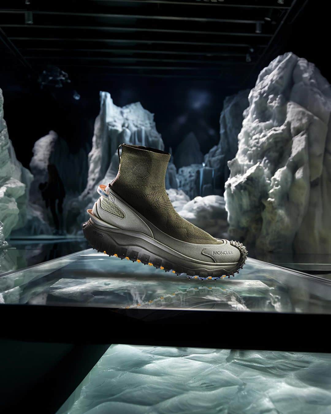 モンクレールのインスタグラム：「The Trailgrip footwear family evolves once again for a new season outdoors.  Introducing the Trailgrip Knit: Moncler’s first sock-sneaker hybrid with breathable perforated upper and moulded rear spoiler for easy-on function - and a smooth take off.   Coming soon to moncler.com  #MonclerTrailgrip」
