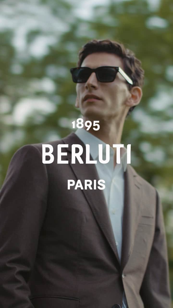 ベルルッティのインスタグラム：「- TRAVEL ICONIC: TOILE MARBEUF BY #BERLUTI -   An effortlessly chic suit. A vintage car with an eccentric twist. A dramatic luggage set: the Berluti man hits the road away from the city skyline and towards the glowing vineyards.   A different way to travel, where the journey is just as important as the destination, and unexpected moments are part of the pleasure of evasion. It’s the Berluti way, embodied by the new Toile Marbeuf line. Stay tuned to discover the full story.   Creative direction by @trendsandculture​ for Berluti  Styling by @benmartinengo  Video by @danielrieraofficial  Model: @thibaudcharon​  #BERLUTITOILEMARBEUF​」