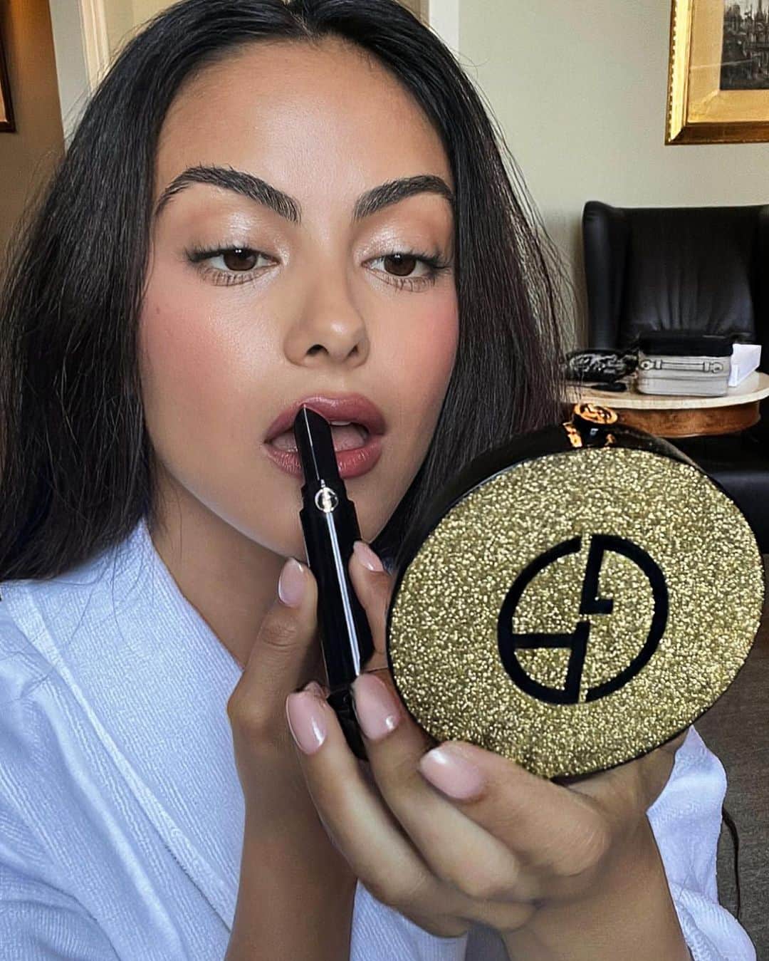 Carolina Gonzalezのインスタグラム：「💄C A M I💄 @camimendes Final Touches with Lip Power 203 for tonight’s 🇮🇹 80th Venice International Film Festival Night with the @armanibeauty family   Hair @peterluxhair  #MakeupbyMe @cgonzalezbeauty  #CGonzalezBeauty    *Luminous Silk Highlighter Coming Soon (pictured)」
