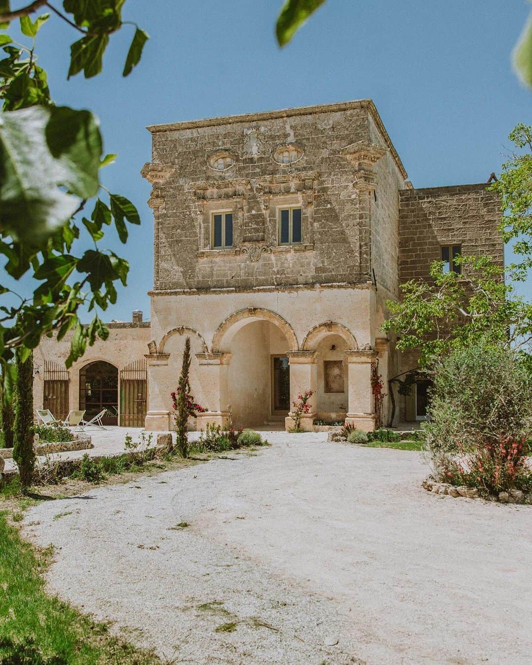 BEAUTIFUL HOTELSのインスタグラム：「Stepping into timeless elegance at IL BARONE in Puglia, captured by @specialpuglia! 🏰✨ This splendid country villa has been sensitively restored, revealing its warm stone and stunning architecture - accompanied by a sleek pool and gardens. And with room for ten across five chic bedrooms, you can gather here with your dream getaway squad. 🌿  Who's visited Puglia, Italy? 🌞   📸 @specialpuglia 📍 IL BARONE, Nardò, Puglia, Italy」
