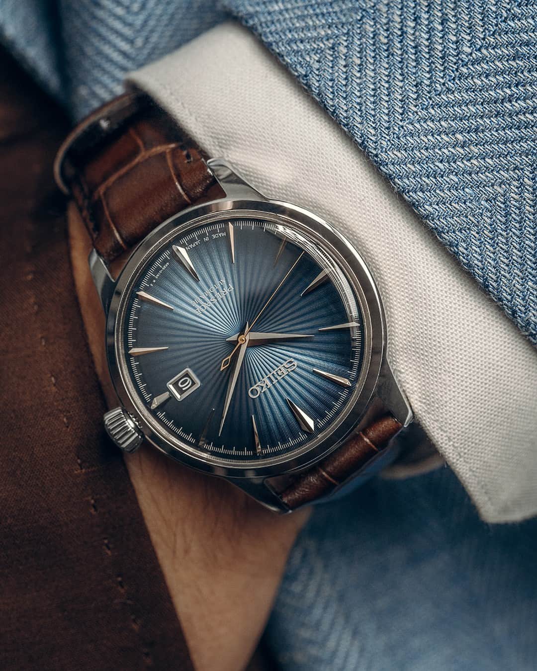 Seiko Watchesのインスタグラム：「Cheers to September with Seiko Presage Cocktail Time! 🌙 - Inspired by the Blue Moon cocktail, #SRPK15 beautifully displays a gradated blue dial with pressed pattern and gloss finish. Paired with a brown leather strap, this timepiece will take your look from casual to classy with one accessory.   #Seiko #Presage」