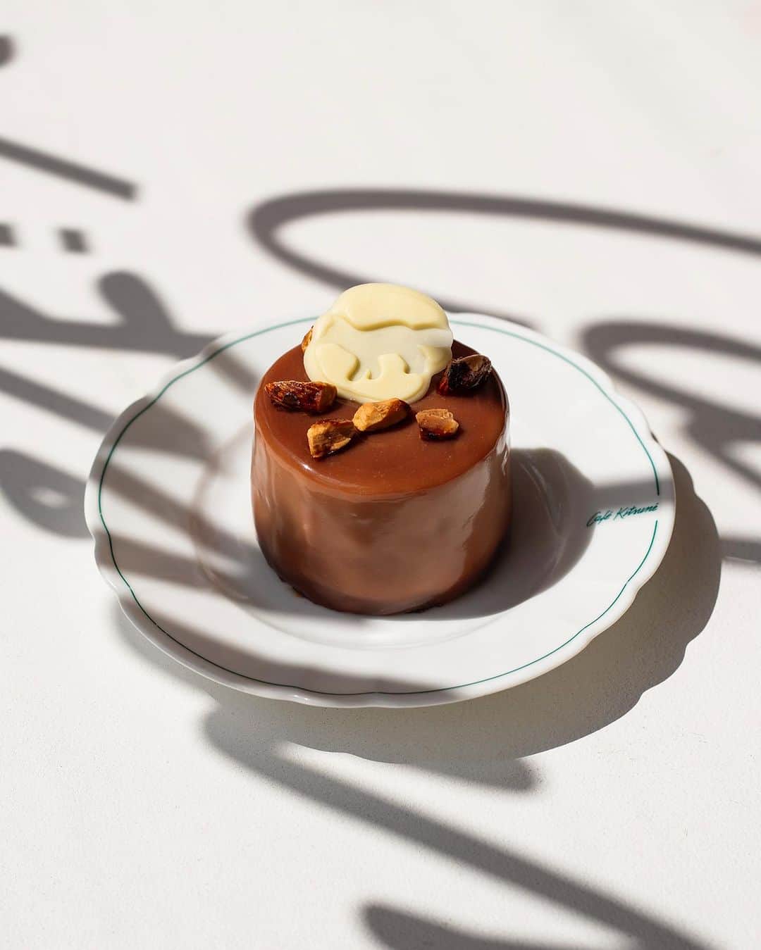 Café Kitsuné Parisのインスタグラム：「Dive into a world of exquisite flavors at #CafeKitsuneLouvre with our new dessert collection created for the season by Hélène Deguen  🥜 'Back to School': a symphony of praline cream, milk chocolate glaze, and caramelized nuts 🌸 ’Frosted Shiso Tart': a crisp creation blending almond cream, zesty shiso ganache, and delicate jasmine tea cream 🍋 ’Yuzu Cabbage': choux pastry bliss filled with yuzu cream, jelly, and a crown of Italian meringue 🍫 ’Chocolate Tart Venezuela': layers of cocoa luxury with dark chocolate ganache and salted caramel  Come to try them all till October 31st⁠⁠⁠⁠⁠⁠ - 👉 Café Kitsuné Louvre 2 place André Malraux, 75001 Paris Monday-Sunday: 8:00am-6:30pm」