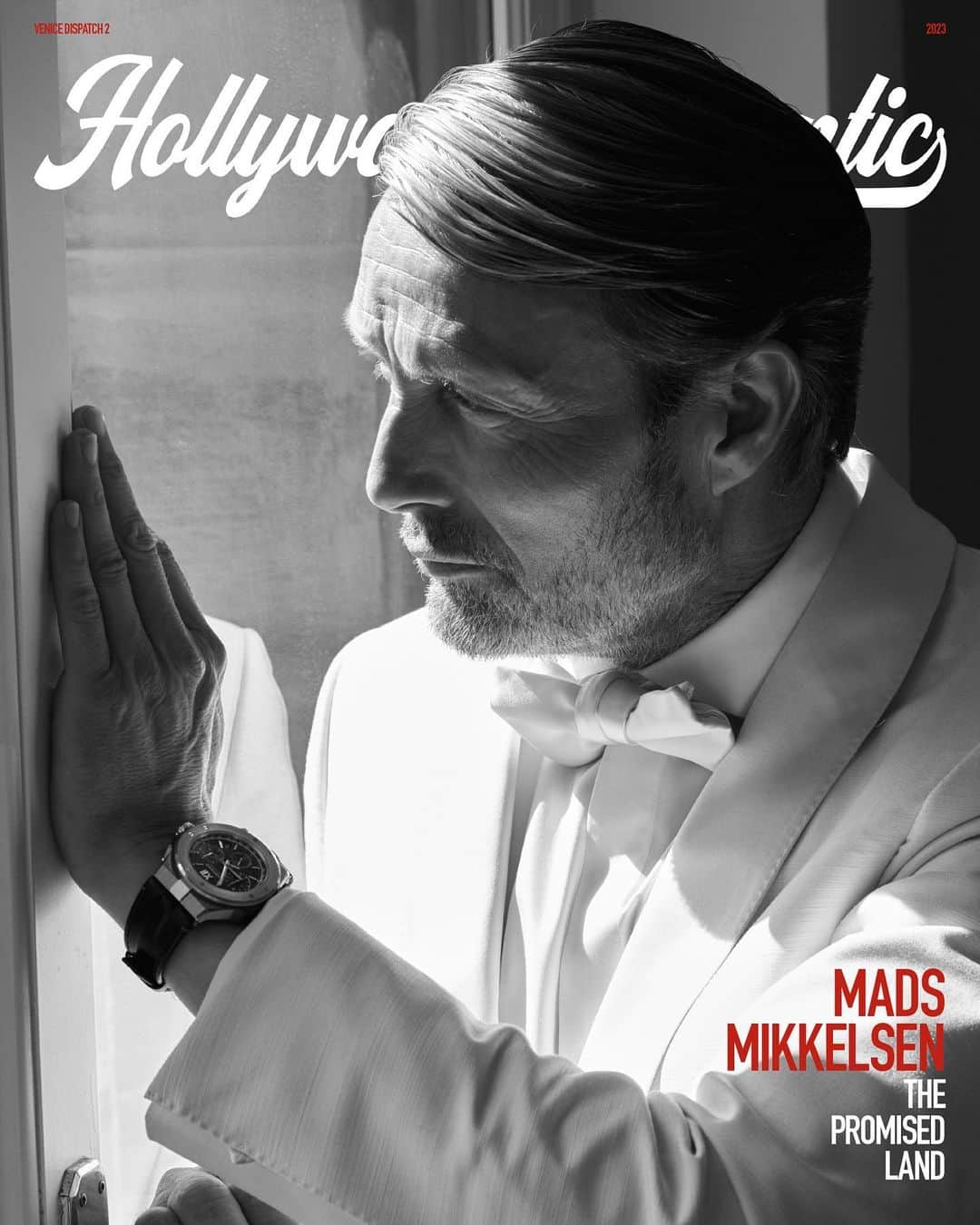 マッツ・ミケルセンのインスタグラム：「Venice Dispatch 2.⁣ ⁣ @theofficialmads before the premier of his new movie The Promised Land at the 80th Venice Film Festival on Friday.⁣⁣ ⁣⁣ Playing in competition in Venice, Nikolaj Arcel’s film portrays Mikkelsen as Captain Ludvig Kahlen who in 1755 sets out to build a colony in the uninhabitable heath of Jutland following the Kings call to cultivate the land.⁣⁣ ⁣⁣ See more exclusives from @hollywoodauthentic, at the link in bio.⁣⁣ ⁣⁣ Mads Mikkelsen wears watch by @chopard, suit by @zegnaofficial ⁣ ⁣⁣ #MadsMikklesen #ThePromisedLand #VeniceFilmFestival #Leica #HollywoodAuthentic #GregWilliamsPhotography #GregWilliams」