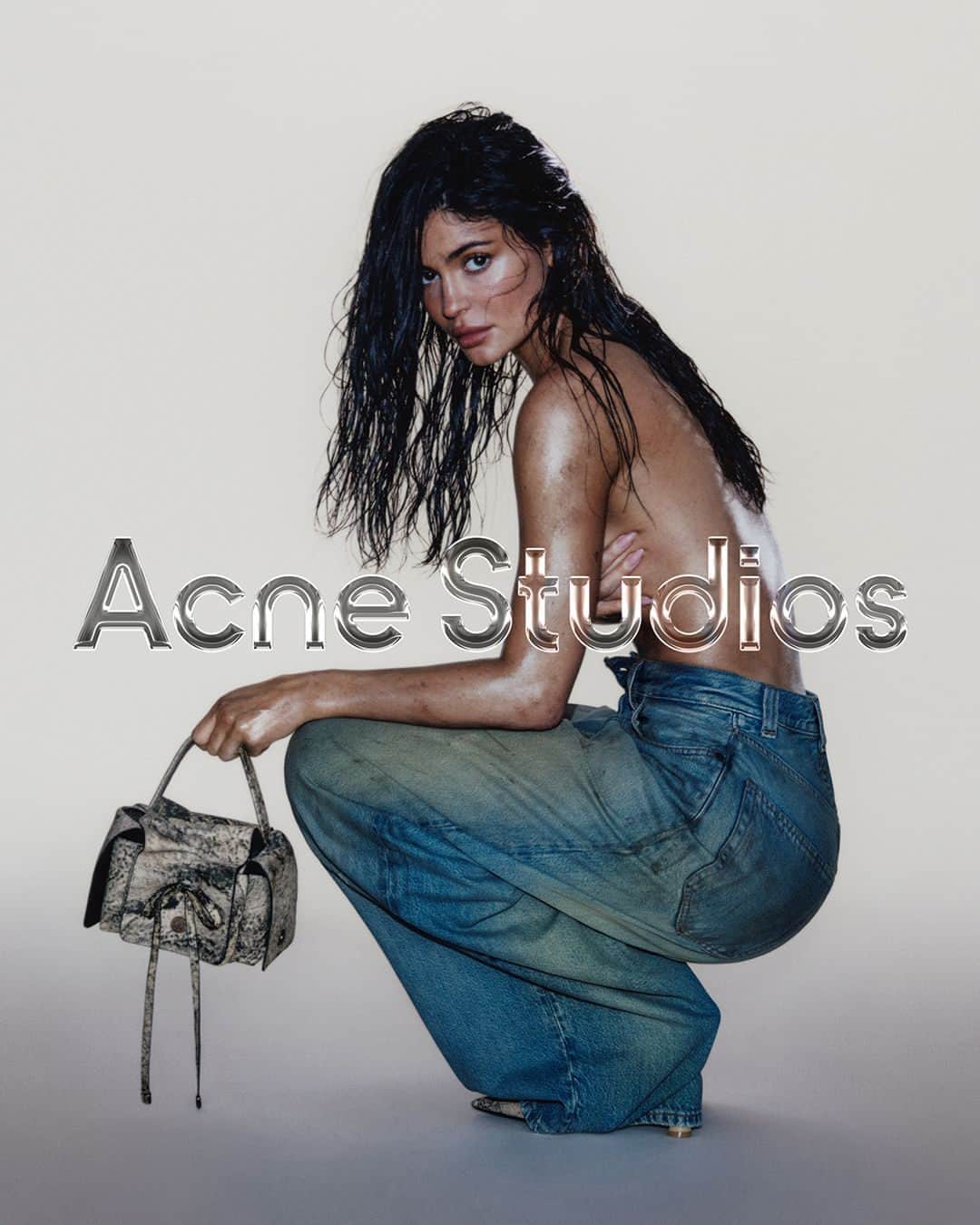 Acne Studiosさんのインスタグラム写真 - (Acne StudiosInstagram)「@KylieJenner bares all. Introducing the ‘2023’, ultra-oversized denim.⁣ ⁣ Available online and in store now. ⁣ ⁣ Photographer: @CarlijnJacobs⁣ Stylist: @Leopolda.Duchemin⁣ Talent’s stylists: @RoseGrandquist and @Makkaroo⁣ Hair: @JesusHair ⁣ Make-Up: @MakeupByAriel and @Masae__Ito ⁣ Set Design: @DavidJamesWhite_⁣ Nails: @NailsByZola」9月5日 0時07分 - acnestudios