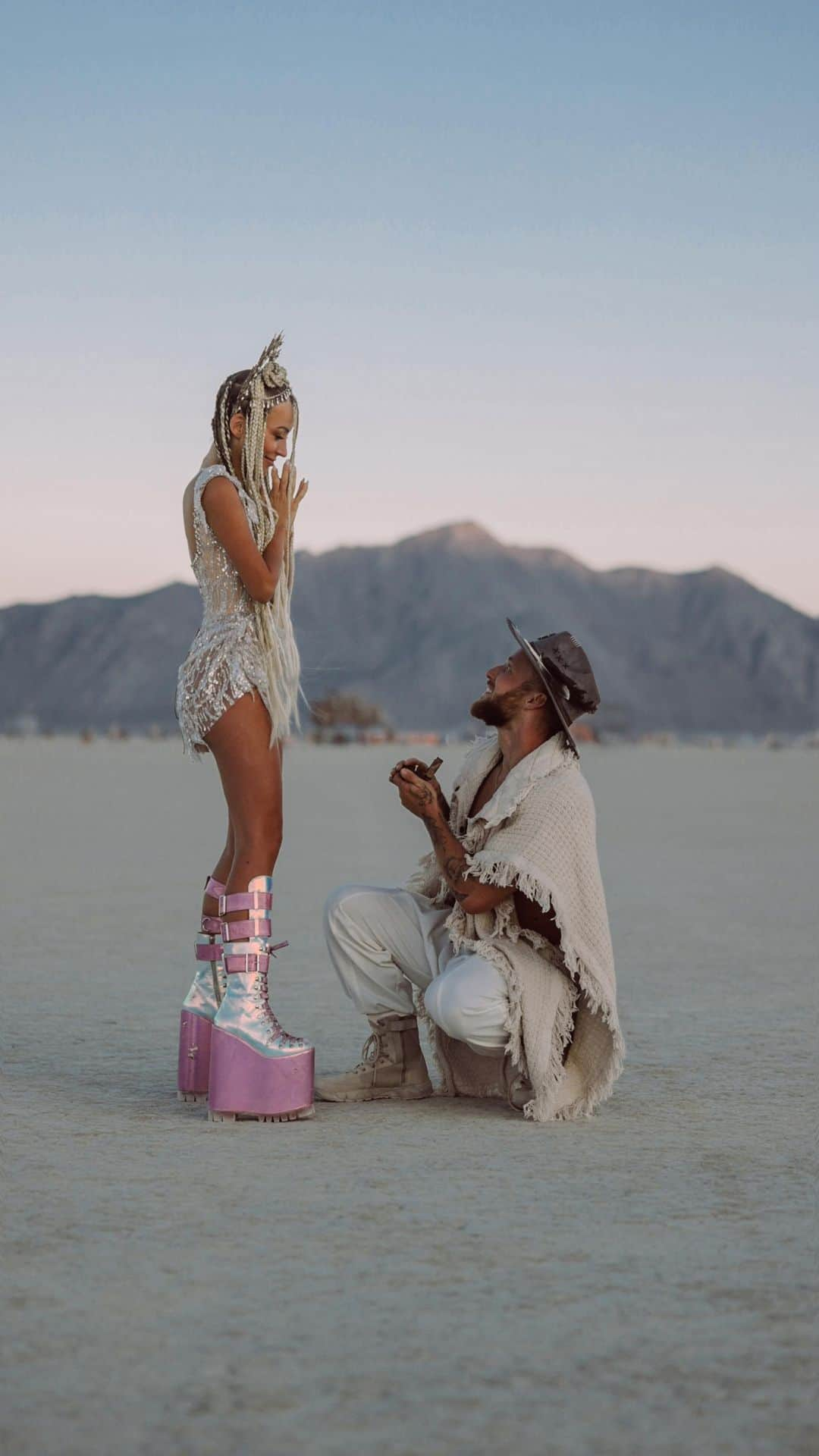 アギーのインスタグラム：「I said YES!!!! 💍💍💍  8/30/23 Last week, on a Super Blue moon 🌕, deep in the playa in the midst of the Burning Man magic, I finally said yes to my best friend. 😭  Then, just as the Playa provided, we ended up running into over 50 of our friends (including one right in the middle of our engagement) and danced the night away in the brightest moon light 🌕  I love you my fiancée and I love we’re engaged!!! 😍🥰  #engagement #burningman #fiancee #blackrockcity #burningman2023 #bm」