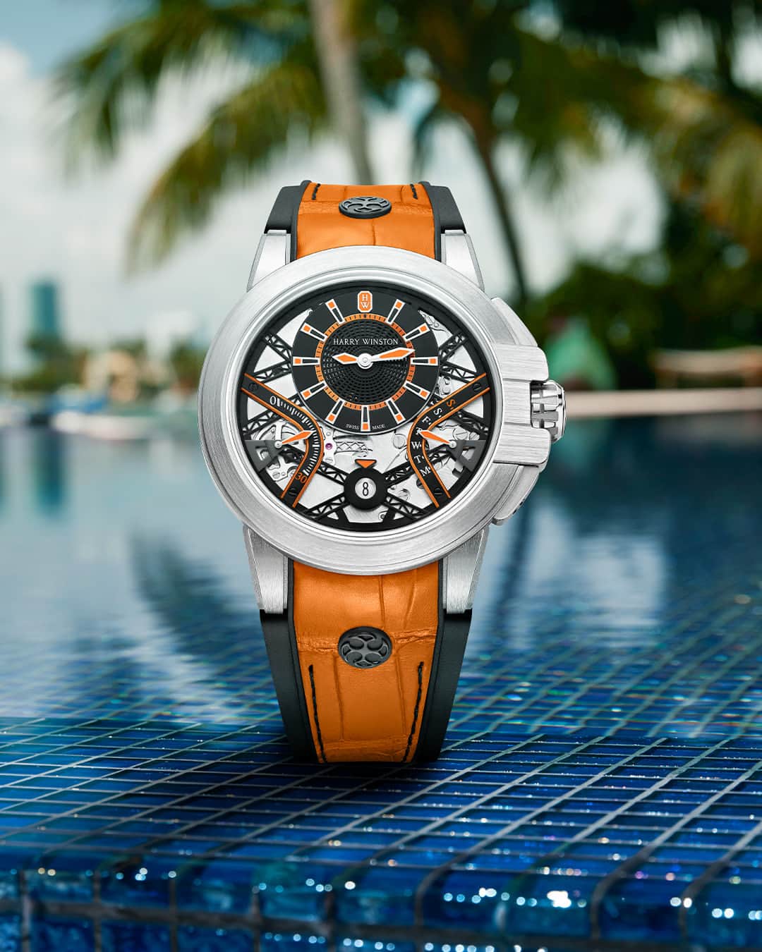 ハリー・ウィンストンのインスタグラム：「With its intricate technical architecture and bold accents of color, the Zalium Variation Orange makes the everyday look vibrant. Tap the link in bio to adorn your wrist with the lively model. #HarryWinston #HWOcean」