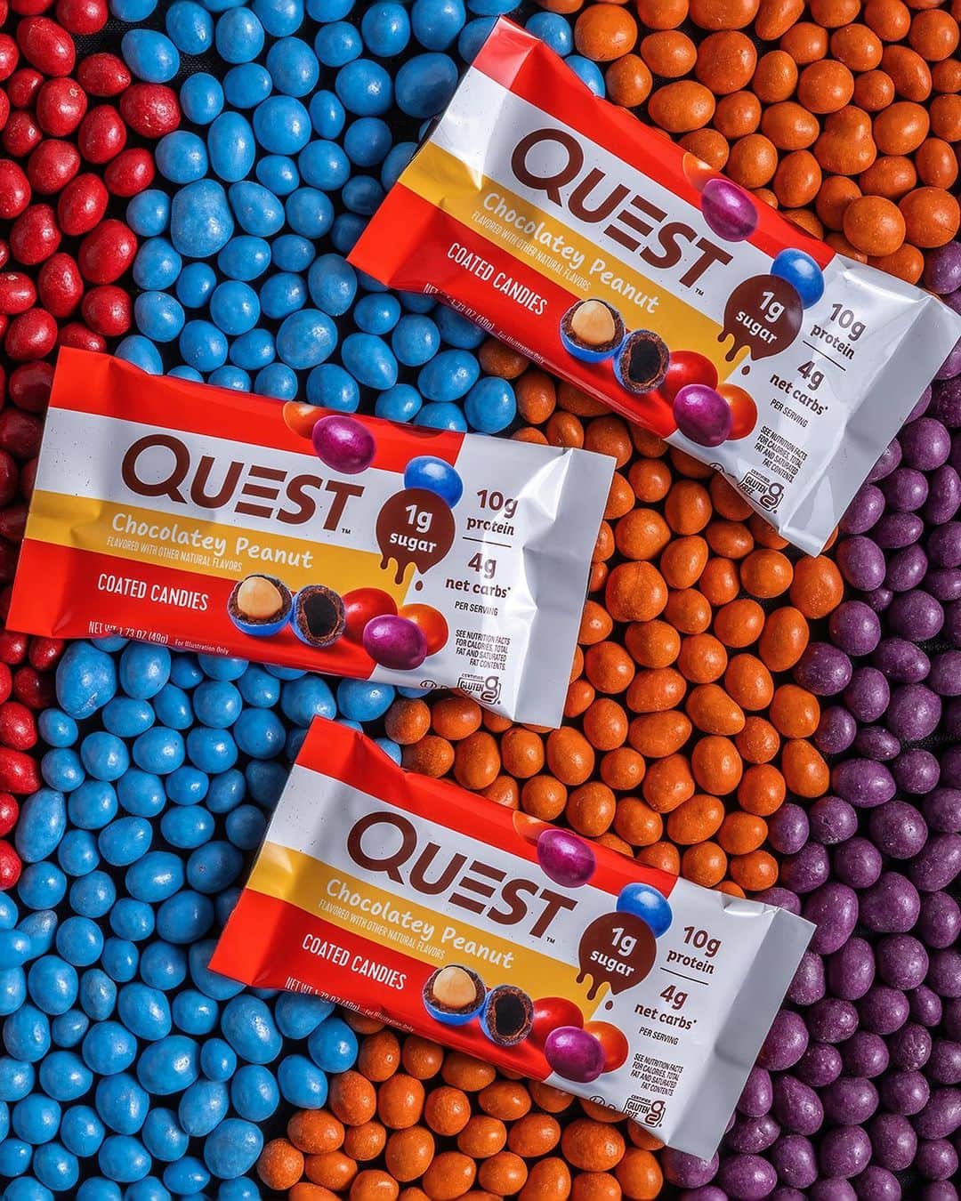 questnutritionのインスタグラム：「DOUBLE TAP to welcome the Quest™ Chocolatey Peanut Coated Candies - 1g sugar, 10g protein, & 4g net carbs per bag! 💪🍬😋These delicious candies have a roasted peanut layered in decadent chocolatey coating encased in a crunchy shell - delivering indulgent flavor & athlete-worthy nutrition in a keto-friendly sweet treat. 😍  AVAILABLE NOW online & in stores at questnutrition.com, @Amazon, @Walmart, @VitaminShoppe, @GNCLiveWell, @HyVee (Midwest), @Wegmans (Northeast), @schnuckmarkets (Midwest), @HarrisTeeter (South), @HEB (Texas), @netrition & your local health/nutrition stores nationwide. #OnaQuest #QuestNutrition #QuestCoatedCandies #QuestCandy」