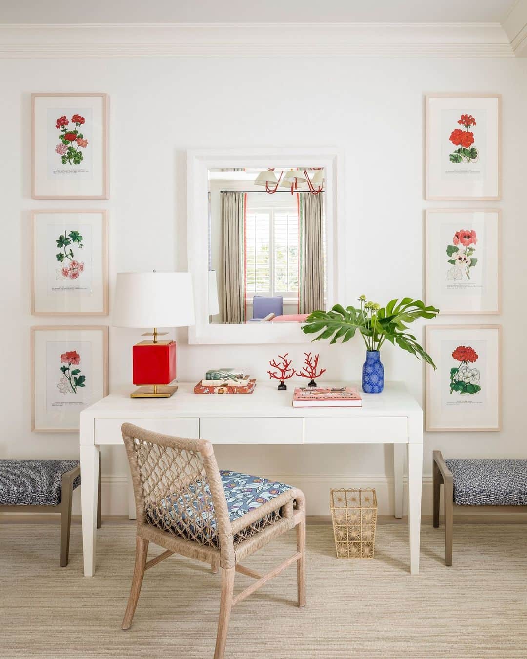 のインスタグラム：「You’re probably not thrilled to be back at your desk post-holiday. That’s why we’re turning our attention to this one—in a Palm Beach house designed ELLE DECOR A-List Titan Victoria Hagan (@victoriahaganinteriors)—instead. The airy WFH vignette, located in a tranquil guest room, incorporates the natural red and coral colors found in the Palm Beach landscape via framed botanical prints and a cherry-red lamp. “It’s a very bright, fun room that really takes you away,” Hagan says. The custom area rug is from Crosby Street Studios, and the plaster-framed beveled mirror is from C.J. Peters.  Click the link in bio for the full tour, as shown exclusively on elledecor.com. Written by @davidbryannash. Photographed by @andrewfraszphoto.」