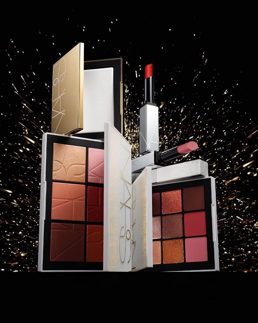 NARSのインスタグラム：「Spark the party. Step into the spotlight with the NEW Holiday Collection, featuring bestsellers and rising stars, all decked out in designs that shimmer and shine. Explore them all in The VIP Gift Guide at narscosmetics.com.  Featuring: All That Glitters Light Reflecting Cheek Palette Endless Nights Eyeshadow Palette Starlight Powermatte Lipstick After Party Light Reflecting Setting Powder」