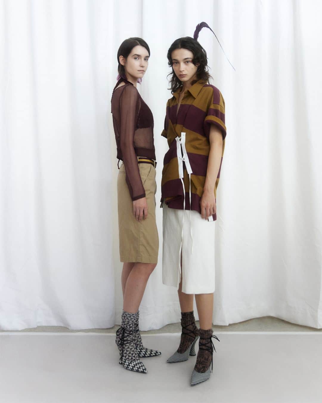 のインスタグラム：「WOMEN SPRING SUMMER 2024  Unfamiliar familiar.  The codes of sports attire applied in unusual ways. A rugby stripe motif recurring across asymmetric dresses, tennis scarves as knitted tops or reworked into the drape of a skirt. Graphic racer checks, contrast club blazers with grosgrain trims   Watch the full video on driesvannoten.com  #DriesVanNoten #DVNSS24 #PFW」