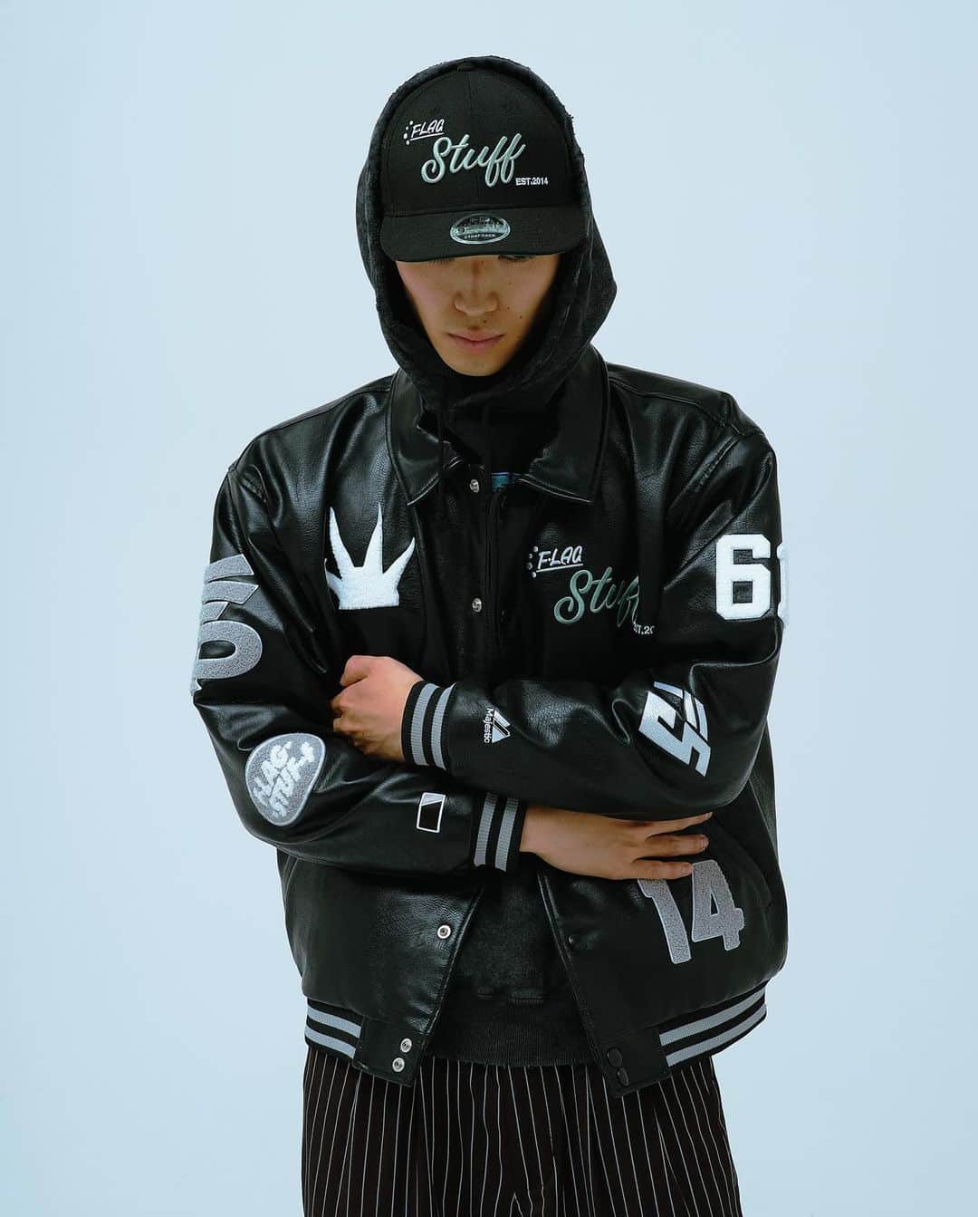 FLAGSTUFFのインスタグラム：「F-LAGSTUF-F 2023AW Collection  •23AW-FS-02(xMAJESTIC) VARSITY JACKET  •23AW-FSxNEW ERA-01 "2014"9 FIFTY LP  Photographer : @kyohei34  Model :  @sota_yamagami」