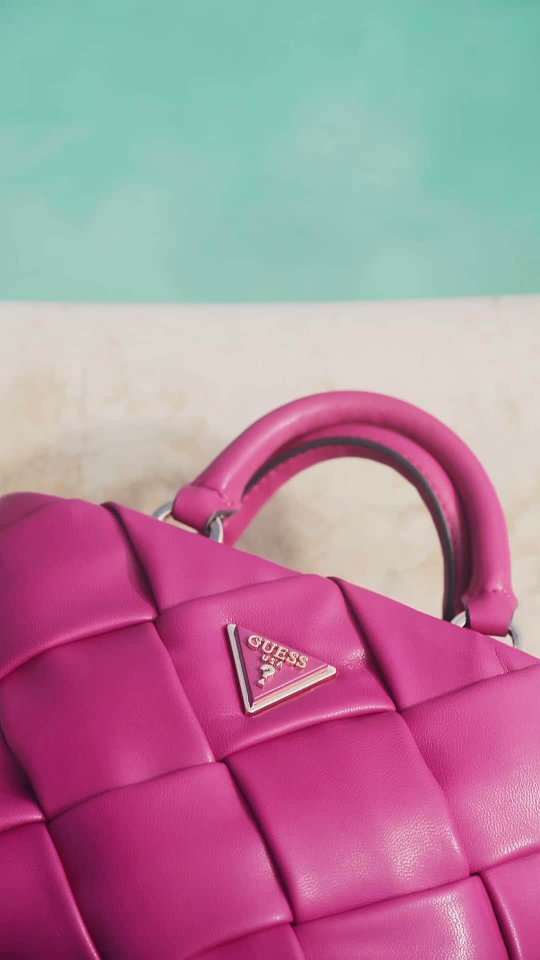 ゲスのインスタグラム：「The Zaina Woven Mini Satchel features padded faux-leather woven design with gold-tone hardware and top handles with 3” drop. #GUESSHandbags」