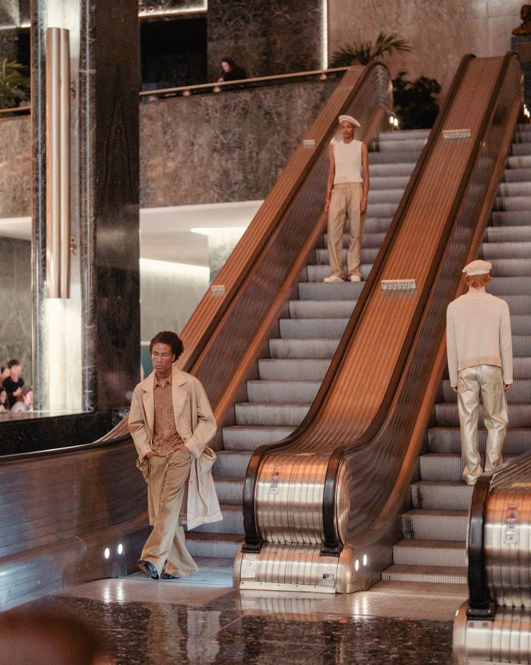New York Times Fashionのインスタグラム：「As New York Fashion Week began, designers told a story about the city as a place of chaos, movement and dreams, writes The New York Times’s chief fashion critic, @vvfriedman.  At the @eckhaus_latta show, models in transparent organza rode up and down the escalators of Rockefeller Center. The 10th-anniversary @coach show, held at the New York Public Library, featured filmy chiffon slip dresses and shredded striped knits that the brand’s designer, Stuart Vevers, said were an exploration of New York style archetypes. The @ralphlauren show, which included lacy denim, jewel-tone harem pants, lamé and fringe, was also city-centric.  Read about the hits and misses of New York Fashion Week so far at the link in bio. Photos by @amirbangs; @isidore_montag/BFA Images; Ralph Lauren; @_janekim; @m_voelkel; @paolo_lanzi_photographer; Go Runway; MONIC; @hannatveite」