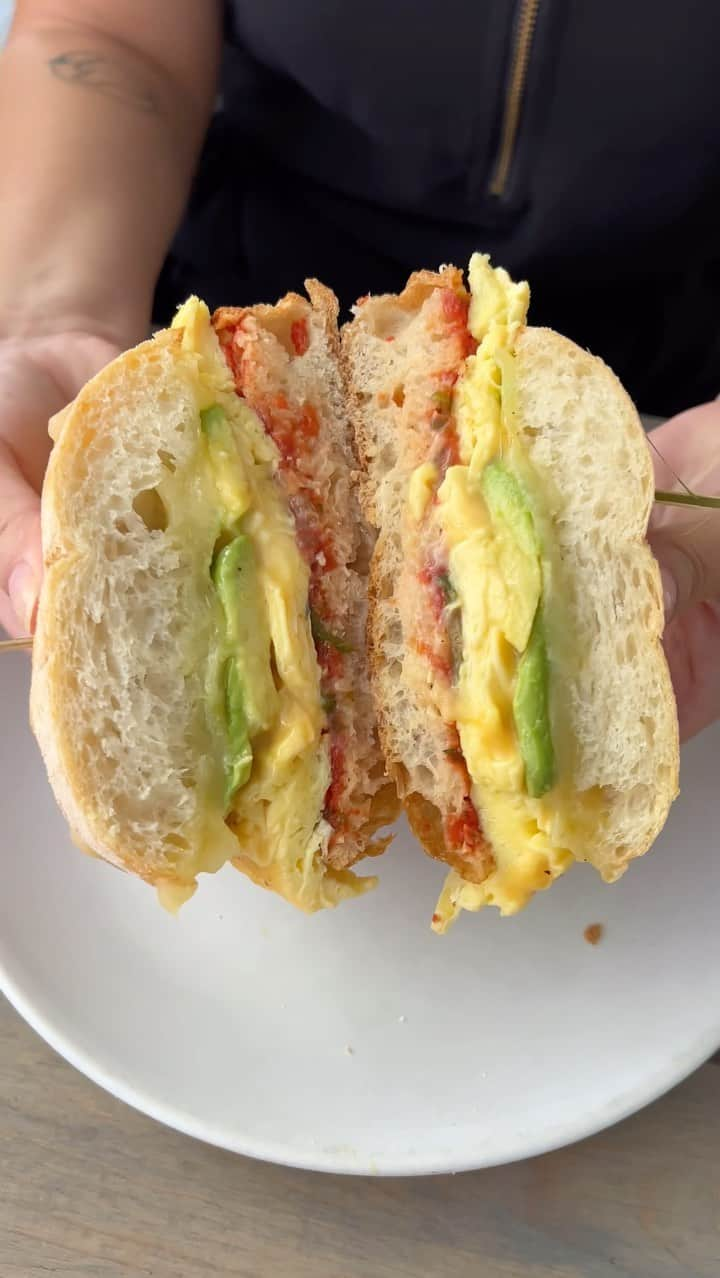 エッグショップのインスタグラム：「Start your day with the perfect bite of our signature A.E.C SANDWICH! Scramble, cheddar, avocado, tomato jam, pickled jalapeños on a ciabatta roll! 🍳🥑💥 #EGGSHOPNYC  📍151 Elizabeth Street (Nolita) 📍138 N 8th (Williamsburg)」