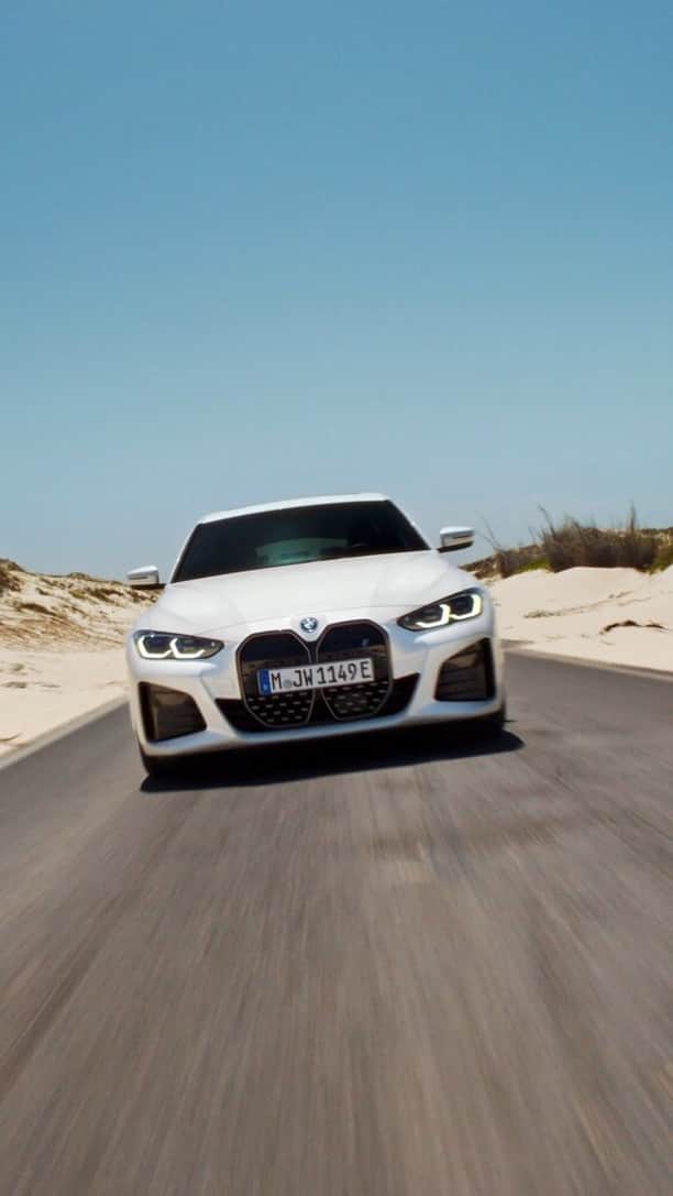 BMWのインスタグラム：「Tracking trail thrills - but make it electric.   #BMWi #BornElectric. __ BMW i4 eDrive40 : Combined power consumption: 19.2–16.1 kWh/100 km. Combined CO2 emissions: 0 g/km. Electric range: 491–590 kilometers.  BMW iX M60: Combined power consumption: 24.7–21.9 kWh/100 km. Combined CO2 emissions: 0 g/km. Electric range: 501–564 kilometers.  All data according to WLTP. Further info: www.bmw.com/disclaimer」