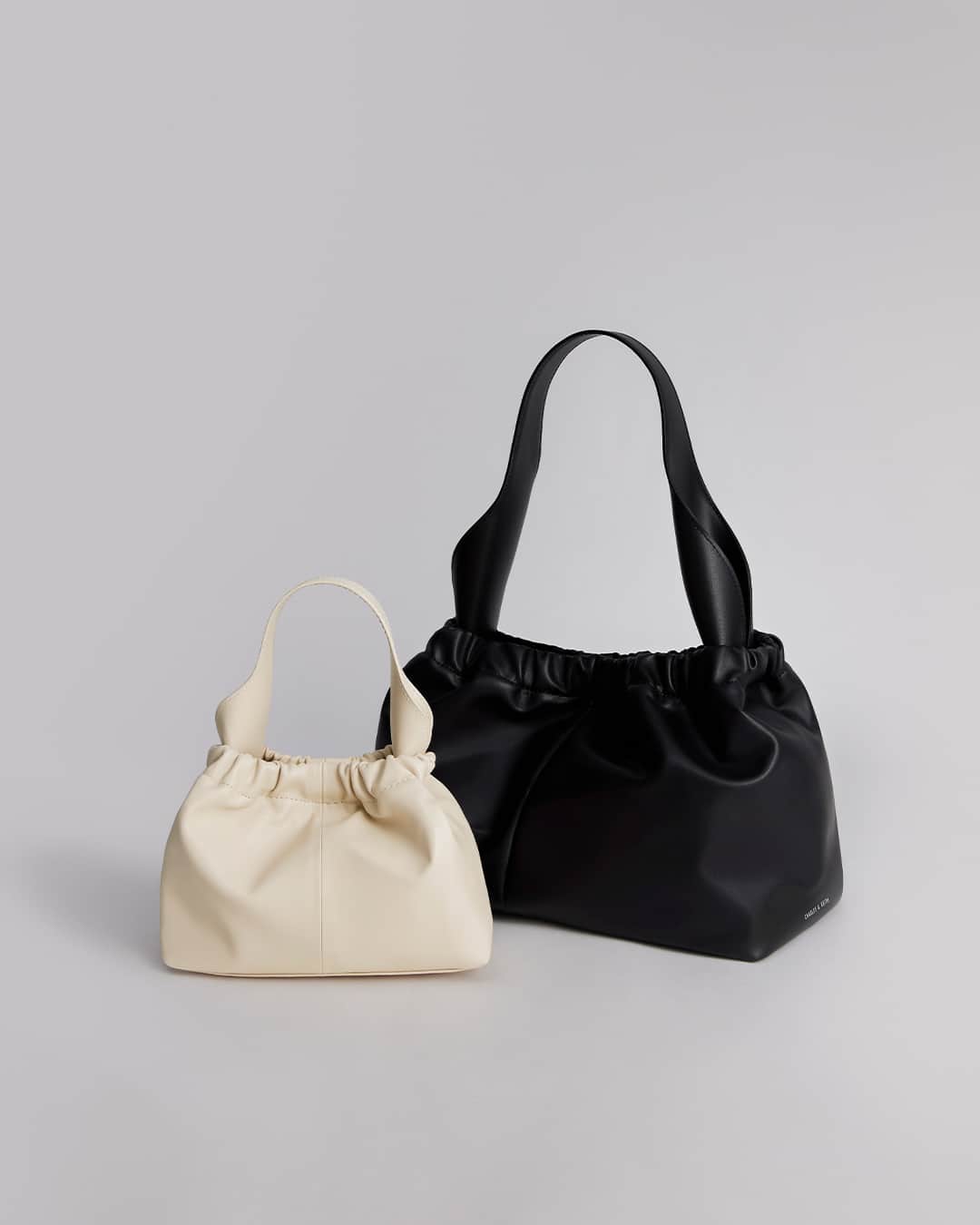 CHARLES & KEITHのインスタグラム：「With ruched detailing and gently curved handles, the Ally slouchy bag is an elegant companion for every occasion.  Discover more via link in bio.  #CharlesKeithFW23 #CharlesKeithOfficial  Product featured: Ally Ruched Slouchy Bag and Large Ally Ruched Slouchy Bag」