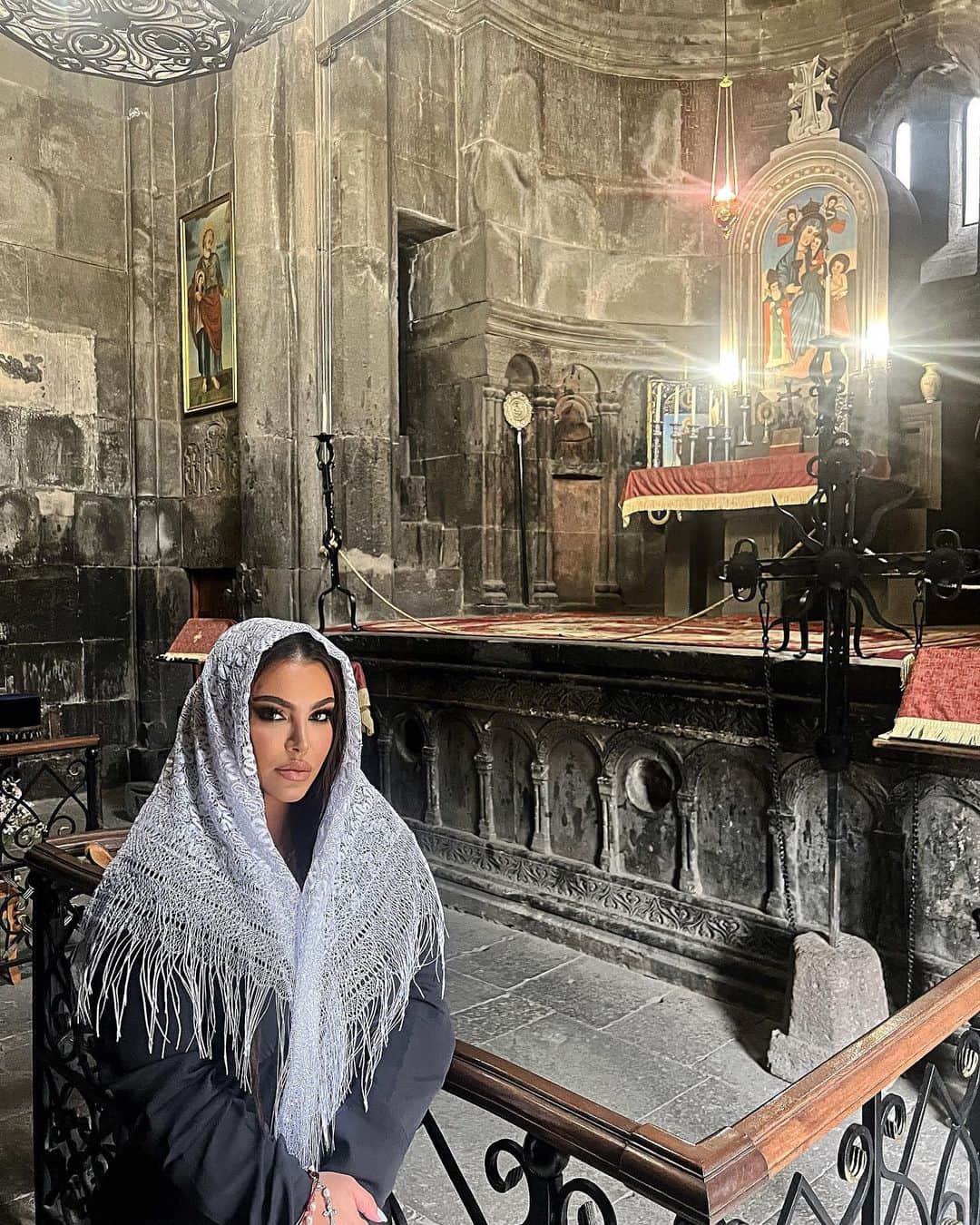 Hrush Achemyanのインスタグラム：「I seek solace in God,  I choose the brighter way. I've never crossed a church's sacred door, And kindled but 1 solitary candle's sacred tone.  I stand barefoot on Garnis hallowed ground, A single candle flickers,  only 1 prayer fills the air, For Artsakh,  I seek strength, protection, and care. As the Bible whispers in verses so divine, "Yea, though I walk through the valley of the shadow of death, I will fear no evil; for thou art with me." With faith as our armor,  In the heart of our Armenian souls,  we bear the legacy of survivors, A testament to resilience,  strength, and unwavering endeavor. We raise our voices, not to dwell on past sorrow, But to cast a light on a present terror  we must not swallow.  Azerbaijan's blockade,  a cruel and heartless thing, Cut off the lifeline to Artsakh,  our sacred land, Where Christian Armenians stand,  hand in hand. For years we relied on Lachin Corridor's grace, For sustenance, aid,  and a healing embrace, But now,  they've used it as a pawn in their game, Azerbaijan's hunger tactics,  an act of shame. For our people,  our homeland,  it's time we discern. The 2020 war,  unprovoked and unjust, Lives on in our hearts,  in our memories, our trust. A cease-fire agreement,  but the attacks persist, Armenian soldiers facing an unyielding twist. Armenophobia spreads,  a poison so vile, Azeri government's policy,  a soulless denial. Regional peace,  it should not demand such a cost, The sovereignty of Artsakh,  a line we can't exhaust. But let it be clear,  to all who can see, This blockade,  it defies all laws of humanity. Blocking the Red Cross,  and words filled with hate, Signs of genocidal fate,  a darkening weight.  We stand united,  as Armenians,  bold and strong, For justice, for freedom,  against all that's wrong!  #Artsakh #ArtsakhStrong #artsakhblockade #artsakhisarmenia」