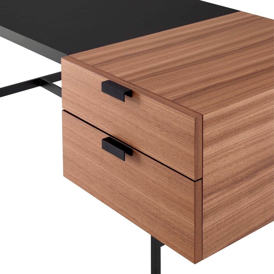 Ligne Rosetのインスタグラム：「A smooth start to the new school year!  The writing surface of the Tanis desk is made of soft-touch, scratch-resistant black «FENIX» laminate, matching the black lacquered steel base, while the 2-drawer unit is veneered in natural walnut.  Discover this expertly designed piece at one of our stores > Link in bio  By Pierre Paulin  #ligneroset #design #frenchsavoirfaire #madeinfrance」