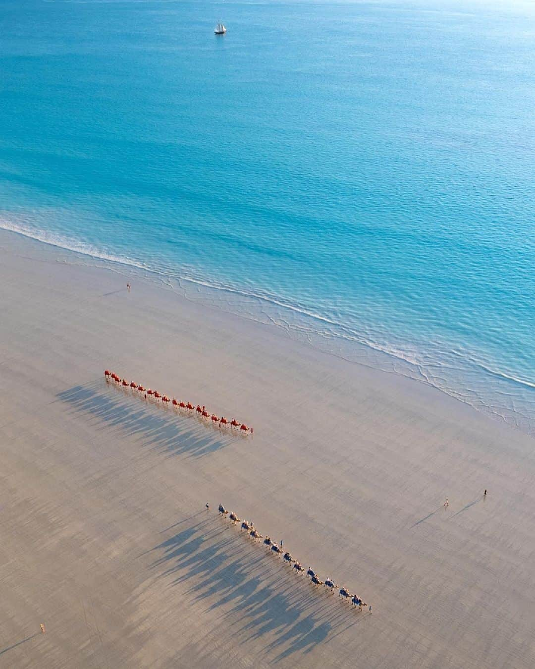 Australiaさんのインスタグラム写真 - (AustraliaInstagram)「Could @visitbroome be any more photogenic?! 💙 Captured here by @earthwithtom, Rubibi (#Broome) is known for its unique multicultural vibe, pearling history, and stunning natural scenery (including the iconic #CableBeach, pictured here). A camel ride along this stretch of sand in @australiasnorthwest is famous for good reason; no trip to this part of @westernaustralia is complete without experiencing the beauty of the beach from camel back. Meet Broome's friendly camels with @broomecamelsafaris, @redsuncamels or @sundownercameltours 🐪. #SeeAustralia #ComeAndSayGday #WATheDreamState #AustraliasNorthWest」9月12日 19時00分 - australia