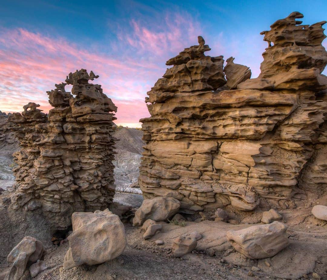 アメリカ内務省さんのインスタグラム写真 - (アメリカ内務省Instagram)「Soft light illuminates the surreal and delicate rock formations of Fantasy Canyon. Located 40 miles south of Vernal, Utah, the naturally weathered sandstone rises dramatically from clay beds, exposing fantastically colored and shaped configurations.    A self-guided rock trail dotted with interpretive signs provides information about the surrounding natural wonders. Even though the area is only about 10 acres, it contains some of the world's most unique geologic features and gives off the feeling you've been transported to another world.    Photos by Bob Wick and John D’Onofrio    #utah #publiclands #recreateresponsibly   Alt Text:    Photo 1: Gray and brown rock formations with deep grooves stand tall during a partly cloudy pink sunset.    Photo 2: Moonlight illuminates the surreal rock formations that have eroded the sandstone into deep grooves in the rock.」9月13日 5時18分 - usinterior