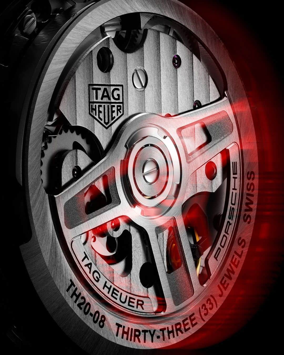 タグ・ホイヤーのインスタグラム：「A touch of racing heritage on your wrist.⁣ ⁣ A first for the TAG Heuer Carrera, this innovative design allows a captivating view of the mechanics through the caseback, showcasing a mass resembling @Porsche's steering wheel.⁣ ⁣ With its central hand accelerating swiftly, gradually decelerating over a period of 60 seconds, and quickly restarting, the TH20-08 exemplifies TAG Heuer's dedication to precision, craftsmanship, and captivating design, establishing a new benchmark in watchmaking.⁣ ⁣ #TAGHeuer #TAGHeuerCarrera」