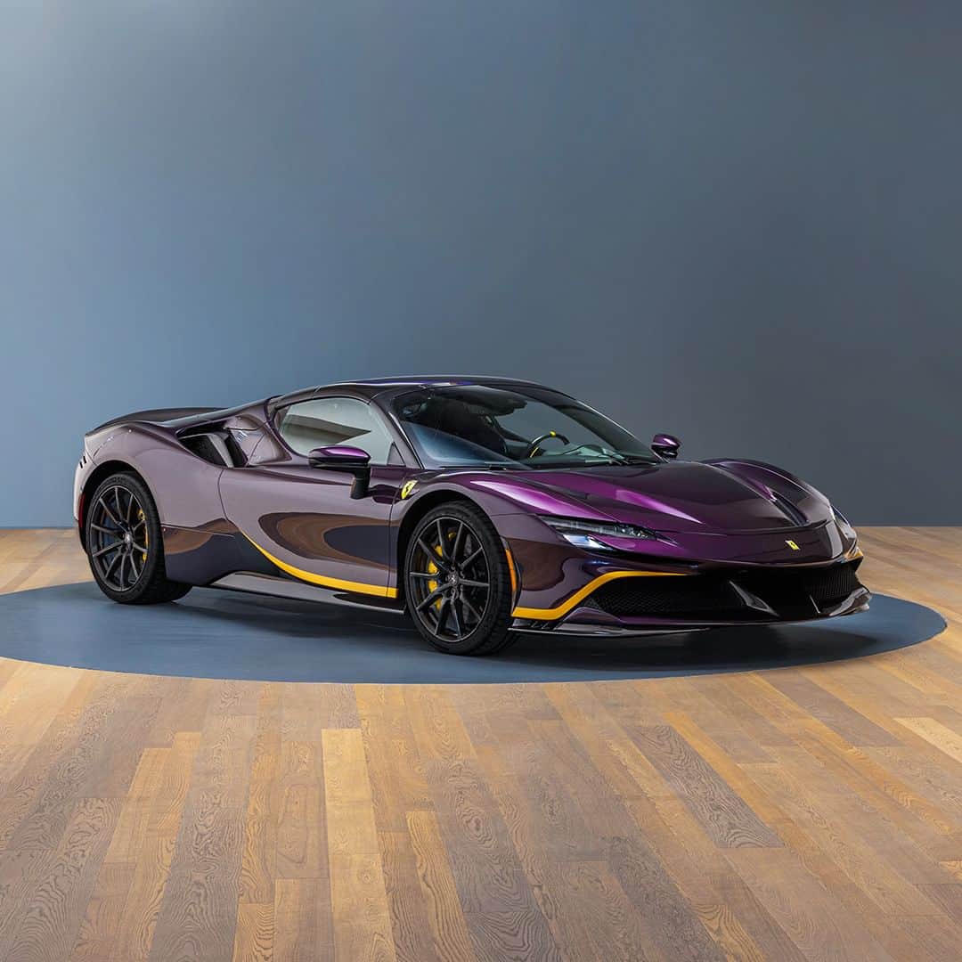 のインスタグラム：「This #FerrariSF90Spider, created thanks to the #FerrariTailorMade programme, shows an aggressive character without detracting from its innate sportiness. The stripes of the Giallo Libano livery shine in contrast with the Viola Hong Kong of the paintwork, and the tones of interiors echo perfectly with the exterior finish of the car.  #Ferrari」