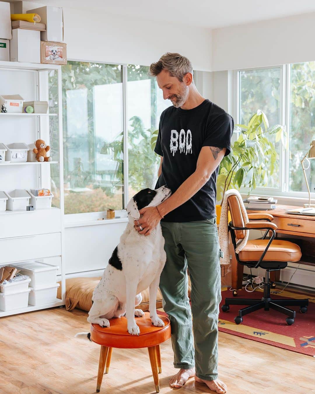 Andrew Knappのインスタグラム：「I’m in front of the camera because shirt! 👻   It’s Boo’s birthday today! I’m commandeering it for a moment because for a short time ONLY, you can preorder this shirt. It’ll be hand screened on quality heavy cotton shirts in early October in hopes of getting it to you by Halloween. It’ll also glow in the dark! Inspired by my favourite vintage shirt which I recreated, and you can (of course) find 3 dogs hiding in the slime.  10% of proceeds will go to @raincoastdogrescue, for the work they continue to do both in Canada and worldwide. Boo is a rescue, and every dog deserves the chance to have a life so good they make books and shirts about him.  Link in profile!」