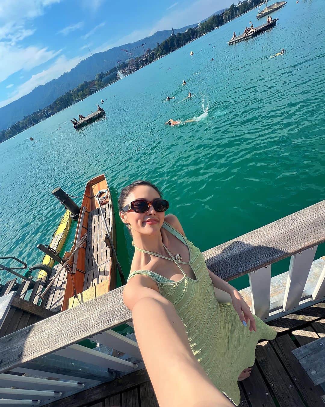 Kim Chiuのインスタグラム：「That feeling when you have that friend who asked you, “Ano gusto mo gawin?…then sabi mo “bahala kana, kahit ano.” Then here we are, straight from the train station, found ourselves swimming at Lake Zurich!!!😳😅🇨🇭🏊🏻‍♀️☀️ #agadagad Feeling like a Swiss local!!! 🥰 Thank you, momsy Bely @bela, for this experience. Days felt like months with you! Miss you sooo muchie, my Taurean twin!!!♉️👯‍♀️💕🥹  #CHIURISTA #OOTDKSYC swimsuit from #HMTropicalEssentials2023 #HMPhilippines 💚   Miss you here momsy @iamangelicap #ANGBEKI 🥹」