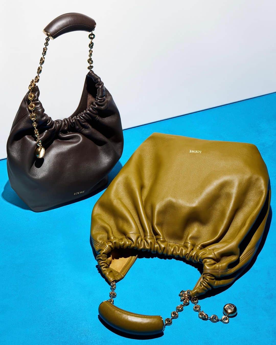 Saks Fifth Avenueのインスタグラム：「Just Landed: @loewe’s latest Squeeze handbag blends alluring tactility with distinctive details (peep the donut chain and squishy handle). #Saks」
