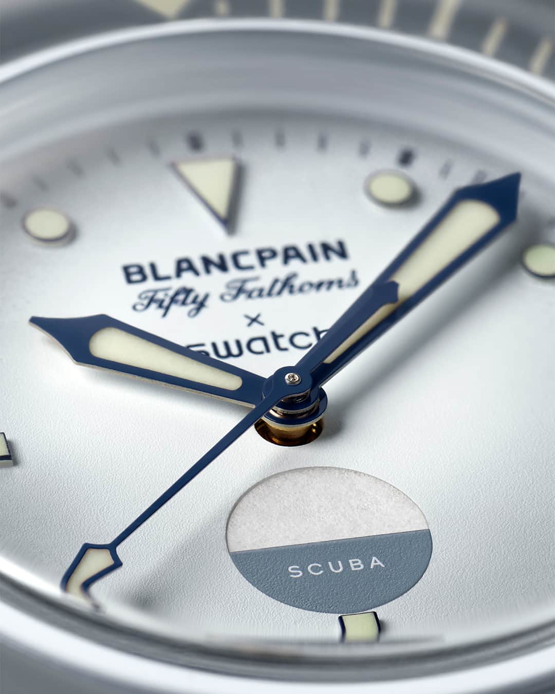のインスタグラム：「Two models in the Bioceramic Scuba Fifty Fathoms Collection feature a special detail on their dials, a nod to the legendary Fifty Fathoms heritage and rich history of diver’s watches.   Celebrating one of the most extreme environments on our planet, the ANTARCTIC OCEAN model has a genuine water contact indicator, an important feature in military diving watches, and a highly sought-after detail among watch collectors.   Featured here: the ANTARCTIC OCEAN   #ScubaFiftyFathoms #BlancpainxSwatch #Swatch」