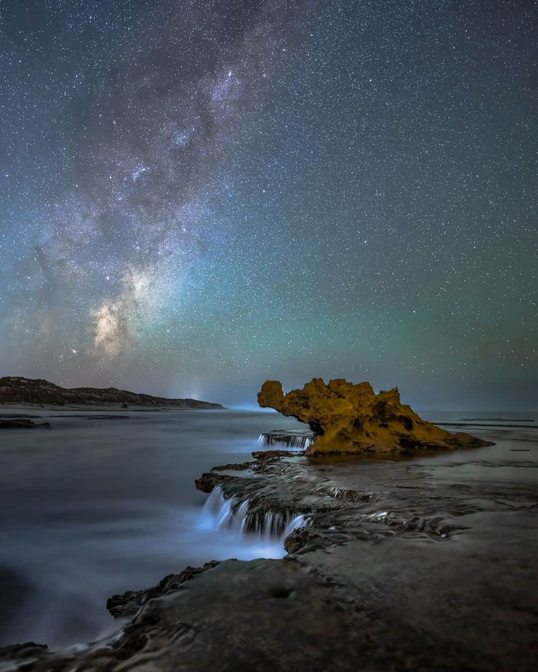 Nikon Australiaのインスタグラム：「Under the stars' light, @imagesbyriccardo's dream came to life at Number 16 beach, where the weather and tide aligned seamlessly to achieve this stunning image*.   "This location had been on my bucket list for a long time. Finally, the night was clear, and the tide was in my favour. I drove to Number 16 Beach and waited for the right moment to head down to the location.  There was no wind, and the weather conditions were perfect. As we know, it is very rare to get perfect weather conditions near the beach. I carefully selected my composition, and this is the result. I was thrilled to see the image turned out exactly as I had envisioned in my mind's eye."  Photo by @imagesbyriccardo   f/2.8 | 15 sec | ISO 3200  Captured on the Z 7 and NIKKOR Z 20mm f/1.8 S   *This image is a stacked photo  #Nikon #NikonAustralia #MyNikonLife #NikonCreators #NIKKOR #Zseries #LandscapePhotography #SeascapePhotography #AstroPhotography #Australia」