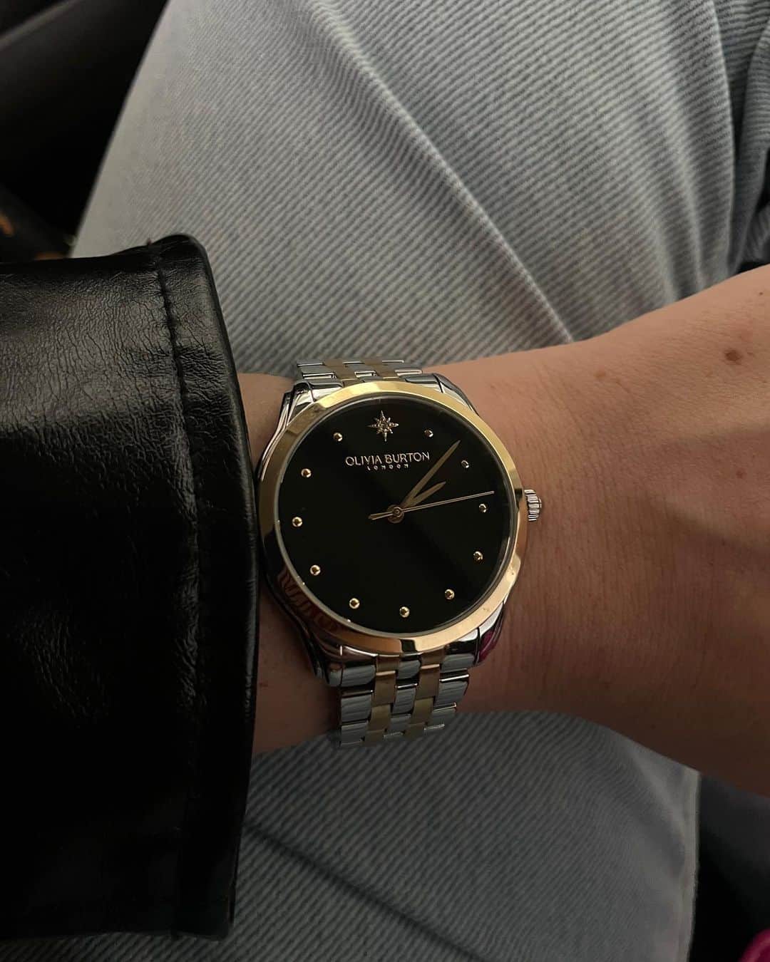 Olivia Burtonのインスタグラム：「Even though the nights are getting darker @araujojuliaa1 is shining bright with our Starlight Black & Two Tone Bracelet Watch.   Tap to shop or head to our Covent Garden store.  #OliviaBurtonLondon #OliviaBurtonwatches #Starlight #WomensWatches」