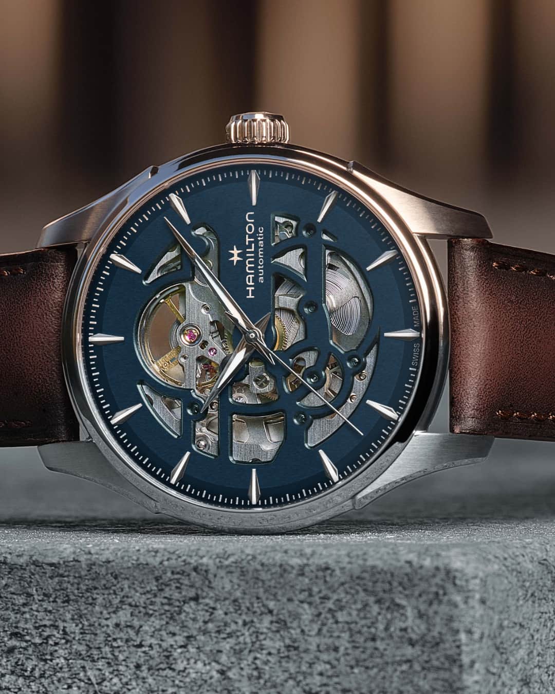 Hamilton Watchのインスタグラム：「Experience the artistry in every ticking moment. Enhanced with a deep blue cut-out dial, the Jazzmaster Skeleton Auto 40mm reveals the intricacies of its H-10-S automatic movement, celebrating the beauty of precision timekeeping.  #hamiltonwatch #new #watch #watchoftheday  (Ref. H42535541)」