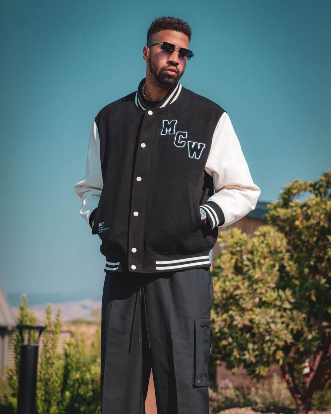 DKNYのインスタグラム：「On top of his game.  @fencer in the DKNY Varsity Jacket.  #DKNYFORYOU」