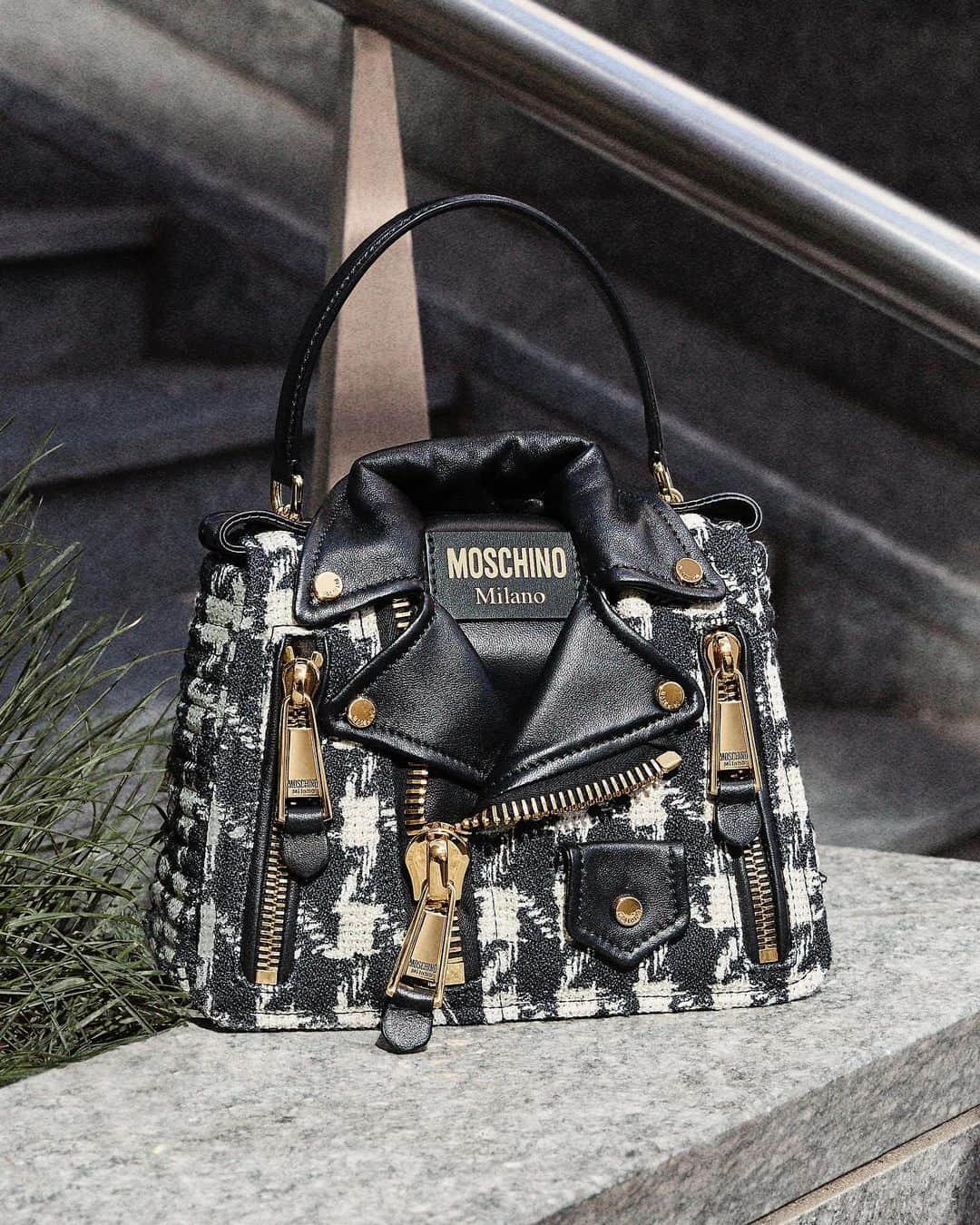 Moschinoのインスタグラム：「Is it even #Moschino if it doesn’t bring the drama? Presenting your favorite accessories – the biker bag and the classic pump – but not as you know them 👀   Your next stop? The link in our bio.   #MoschinoAccessories #MoschinoBikerBag #MochinoFW23」