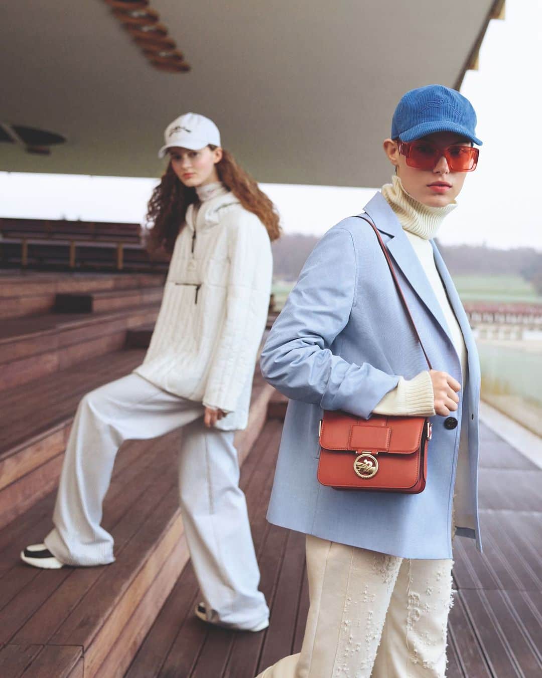 Longchampのインスタグラム：「From city to paddock.   Collection: #LongchampFW23 Bag: #LongchampBoxTrot Ready-to-wear: @longchamp   Photographer: @eddiewrey   Casting: @julialangecasting Hair stylist: Pierre Saint-Sever Make-up artist: @helenevasnier Model: @mariebelleworlds and @ilse.rood   #longchamp #newcollection #backtoschool #longchampgirls #jockey #ootd #outfit #horseracing #frenchy #elegant #urban #fulllook」