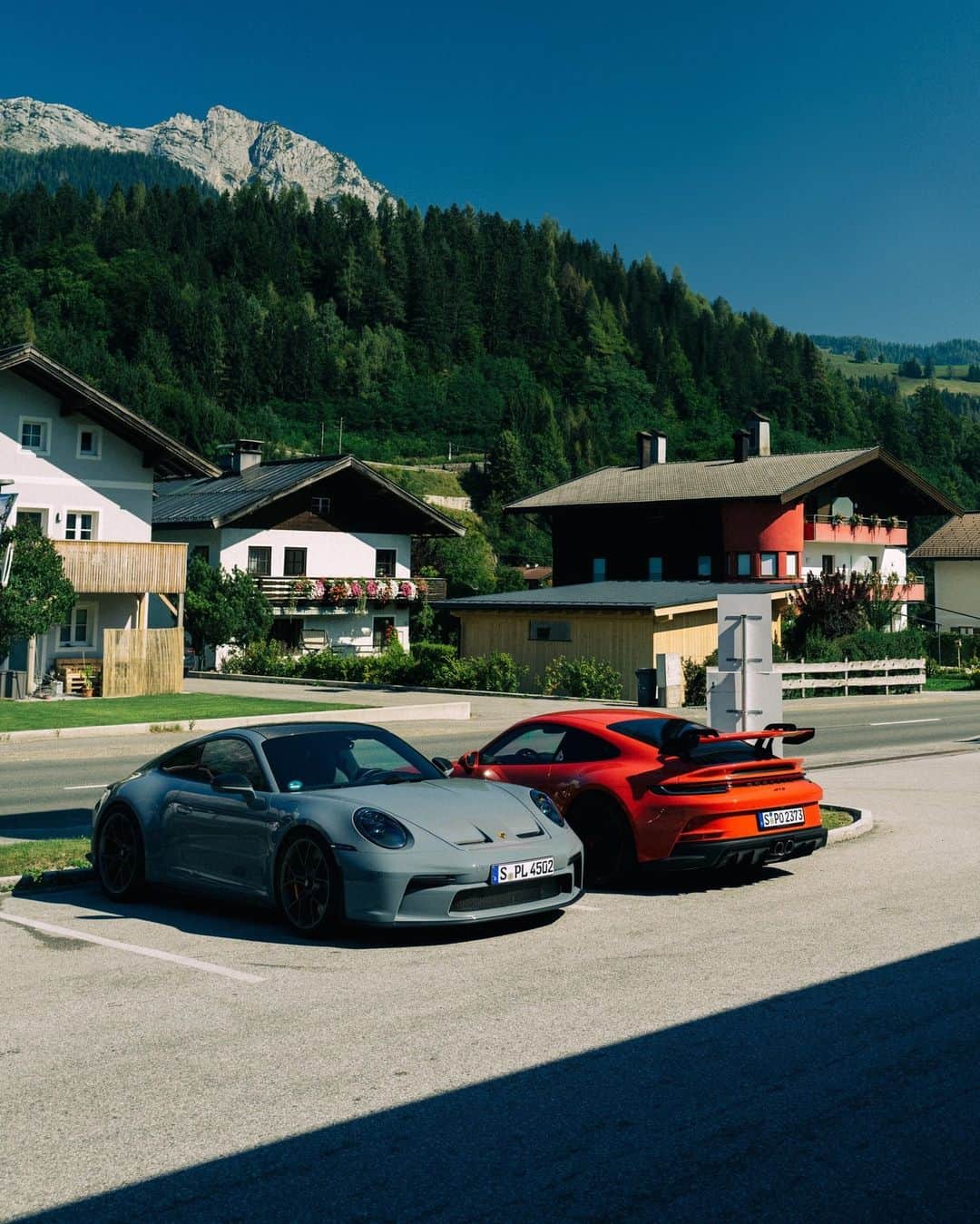 Porscheのインスタグラム：「Next stop, the Alps! Join us as we gather together some 911 friends and set out on a road trip through breathtaking scenery. For two days they explore remote Alpine roads and villages, taking in views that will linger long in the memory. A 911 and mountains? There are few better ingredients for a perfect road trip. 📷 @andrew_ftw and @thvddeus  __ 911 GT3: Fuel consumption combined in l/100 km: 13,0 - 12,9 (WLTP); CO2 emissions combined in g/km: 294 - 293 (WLTP); 911 Carrera GTS: Fuel consumption combined in l/100 km: 11,4 - 10,4 (WLTP); CO2 emissions combined in g/km: 258 - 236 (WLTP); 911 Turbo S Cabriolet: Fuel consumption combined in l/100 km: 12,5 - 12,1 (WLTP); CO2 emissions combined in g/km: 284 - 275 (WLTP) I https://porsche.click/DAT-Leitfaden I Status: 09/2023」