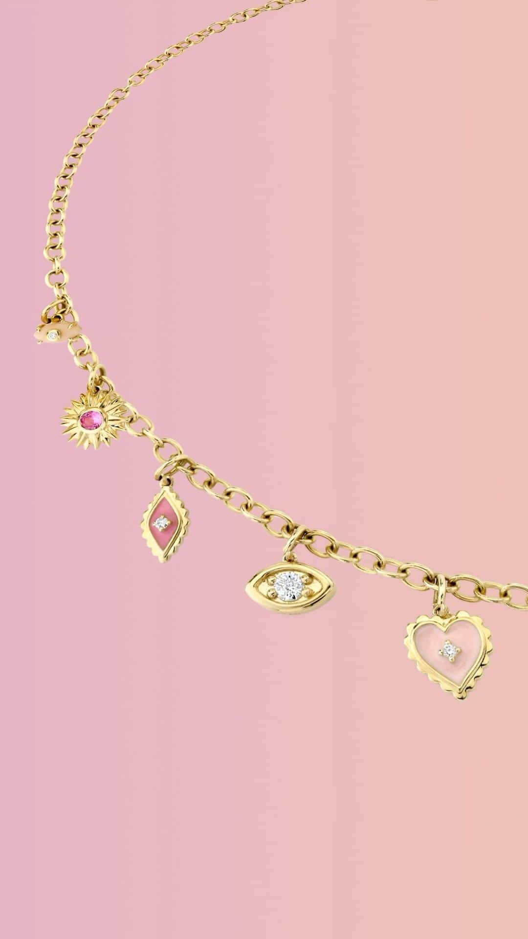 のインスタグラム：「New Additions Spotlight 😍 Featured here, our Feminine Fatale Multi-Charm Necklace pays homage to the brand’s rich heritage with iconic #SydneyEvan elements, such as the protective evil eye, now infused with a feminine touch.」