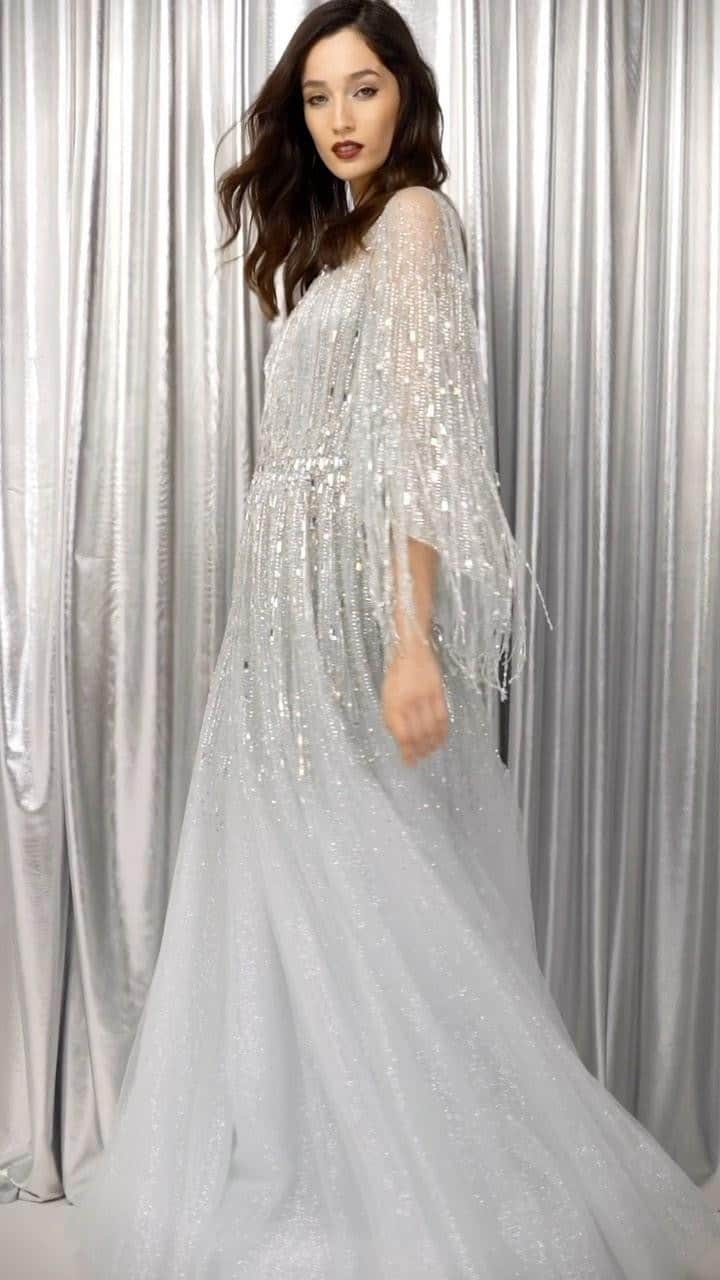 ジェニーパッカムのインスタグラム：「Hestia, crystal-embellished gown from the Fall/Winter 23 collection available in-store and online now.  #jennypackham #aw23 #fall23 #vogue #runway #paris #milan #newyork #la #dubai #fashion #style #hollywood」