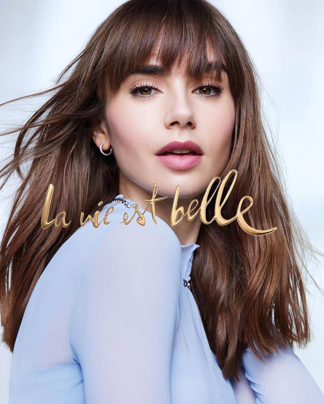 リリー・コリンズのインスタグラム：「New for @lancomeofficial. Honored to be the face of La vie est belle L'Extrait and to have been behind the lens of the incomparable @mario_sorrenti…」