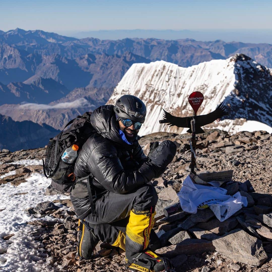 マーモットのインスタグラム：「Life's a climb AND the view is great! ⛰️   Max Djenohan (@nomadikmax) on the summit of Aconcagua at 22,837ft. The south summit and the south face is visible behind him, The team started the summit push at 9:00pm and arrived at 8:20am the next day. Worth. Every. Second.   Aconcagua Provincial Park. February 2023.  Photo: @jsack_foto  #Marmot」