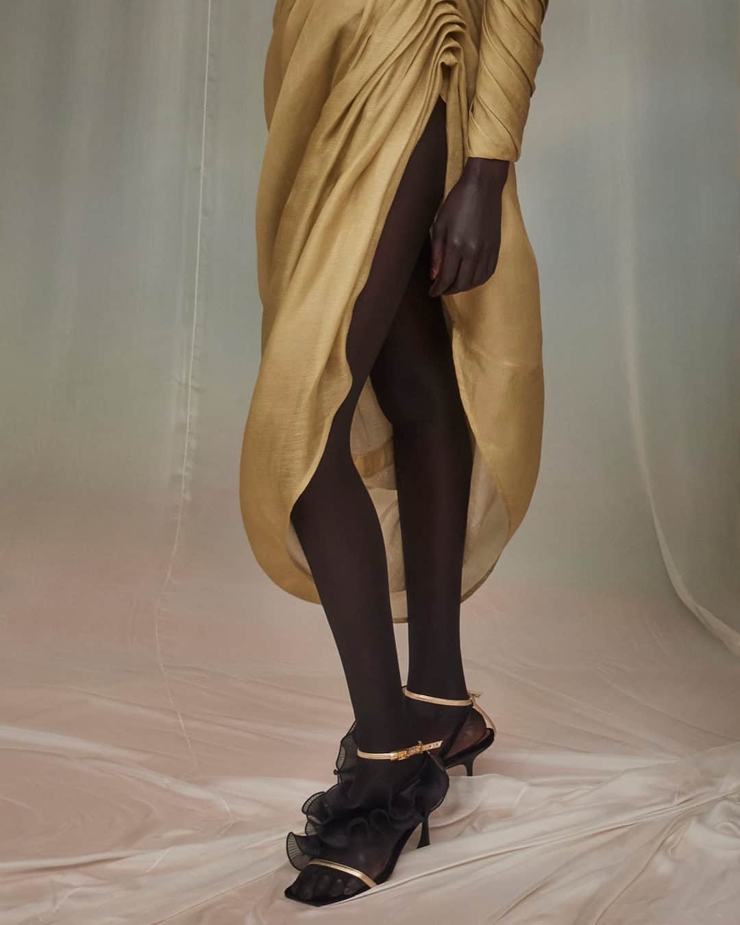 ジマーマンさんのインスタグラム写真 - (ジマーマンInstagram)「Golden: The Sensory Drape Midi Dress from Fall 23 has now landed in stores and online. Styled here, with the Pebble Statement Earrings and Zimmermann Loie Sandals 85. #Luminosity #ZimFall23 #zimmermann」9月19日 18時30分 - zimmermann