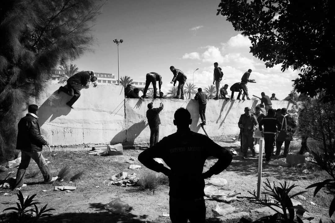 Magnum Photosさんのインスタグラム写真 - (Magnum PhotosInstagram)「A new exhibition by @paolopellegrin, L’orizzonte degli eventi (Event Horizon), is showing at @lestanzedellafotografia in Venice, Italy, until January 7, 2024. ⁠ ⁠ Featuring more than 300 images, L’orizzonte degli eventi surveys Paolo Pellegrin’s work in the field from 1995 to 2023, documenting conflicts and the effects of climate change. ⁠ ⁠ "In physics, the event horizon is the theoretical zone surrounding a black hole, a boundary beyond which even light loses its ability to escape," explains Annalisa D'Angelo, co-curator of the show alongside Denis Curti. ⁠ ⁠ “In his long career as a photographer, Pellegrin has continually sought to push beyond the horizon, to enter the black hole of history, trying to overcome obstacles. And his vehicle for going beyond the horizon and ideally returning from the black hole is photography"⁠ ⁠ 🔗 For more information, visit the link in bio.⁠ ⁠ PHOTOS (left to right):⁠ ⁠ (1) Civilians arrive in Tyre after fleeing their villages in southern Lebanon during Israeli airstrikes. Tyre. Lebanon. 2006.⁠ ⁠ (2) Tunisian, Egyptian and other nationals flee Libya during fighting between rebels and pro Qaddafi forces and arrive at the border crossing in Ras Jdir near Ben Gardenne, Tunisia. 2011.⁠ ⁠ (3) Mother of a child killed during the IDF’s incursion into Jenin. West Bank. 2002.⁠ ⁠ (4) A man arrested by the police after assaulting his father. Rochester. USA. 2012.⁠ ⁠ (5) Detainees in camp 4. Guantanamo. Cuba. June 2006.⁠ ⁠ © @paolopellegrin / Magnum Photos」9月20日 0時01分 - magnumphotos