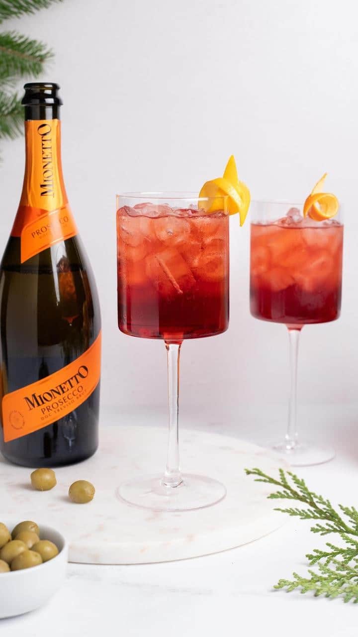 Mionetto USAのインスタグラム：「Allora! Get ready for a Mio Negroni Sbagliato Giusto featuring Mionetto Prosecco!  This cocktail’s name, “sbagliato,” means “bungled” in Italian, but it’s made right with a Brut Prosecco like Mionetto. Instead of gin, it uses sparkling wine, creating a delightful effervescence.   Celebrate Negroni Week with a twist on this classic drink by mixing 1 oz. of Sweet Vermouth and 1 oz. of Campari over ice, then topping it with Mionetto Prosecco Brut Treviso DOC. Garnish with citrus peels for extra flavor. If you want to stick with the traditional version simply swap the Prosecco for gin. You can enjoy both on the rocks or in a stemmed glass. Salute!  Invite your friends to join the toast! 🧡🍾  🇪🇺 CAMPAIGN FINANCED ACCORDING TO EU REGULATION NO. 3018/2013.   #NegroniSbagliato #MionettoProsecco #NegroniWeek   Mionetto Prosecco material is intended for individuals of legal drinking age. Share Mionetto content responsibly with those who are 21+ in your respective country. Enjoy Mionetto Prosecco Responsibly.」